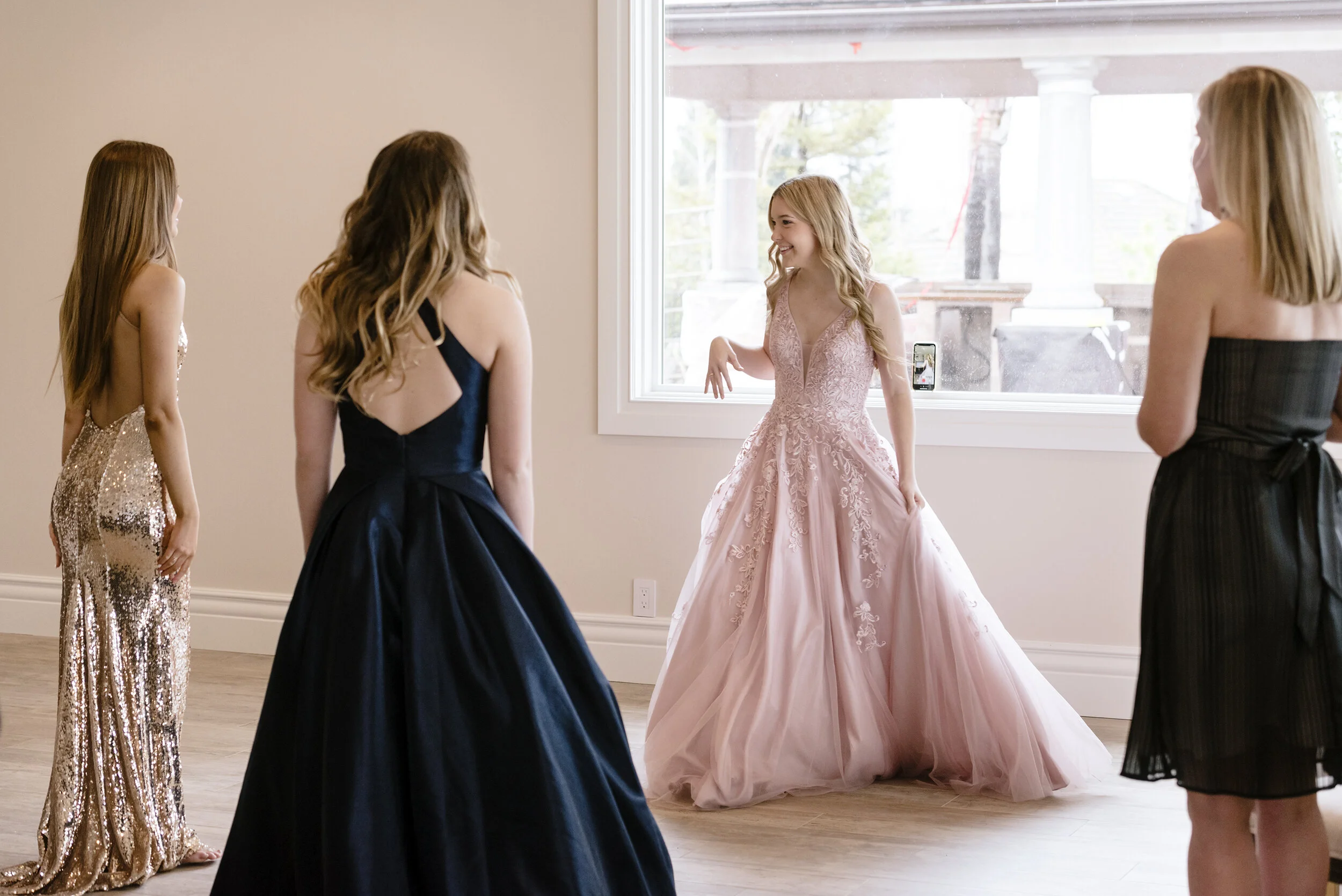  The Reese family films TikTok videos of themselves celebrating the girls' canceled high school prom from their home in Danville, Calif, on Saturday, March 28, 2020.     