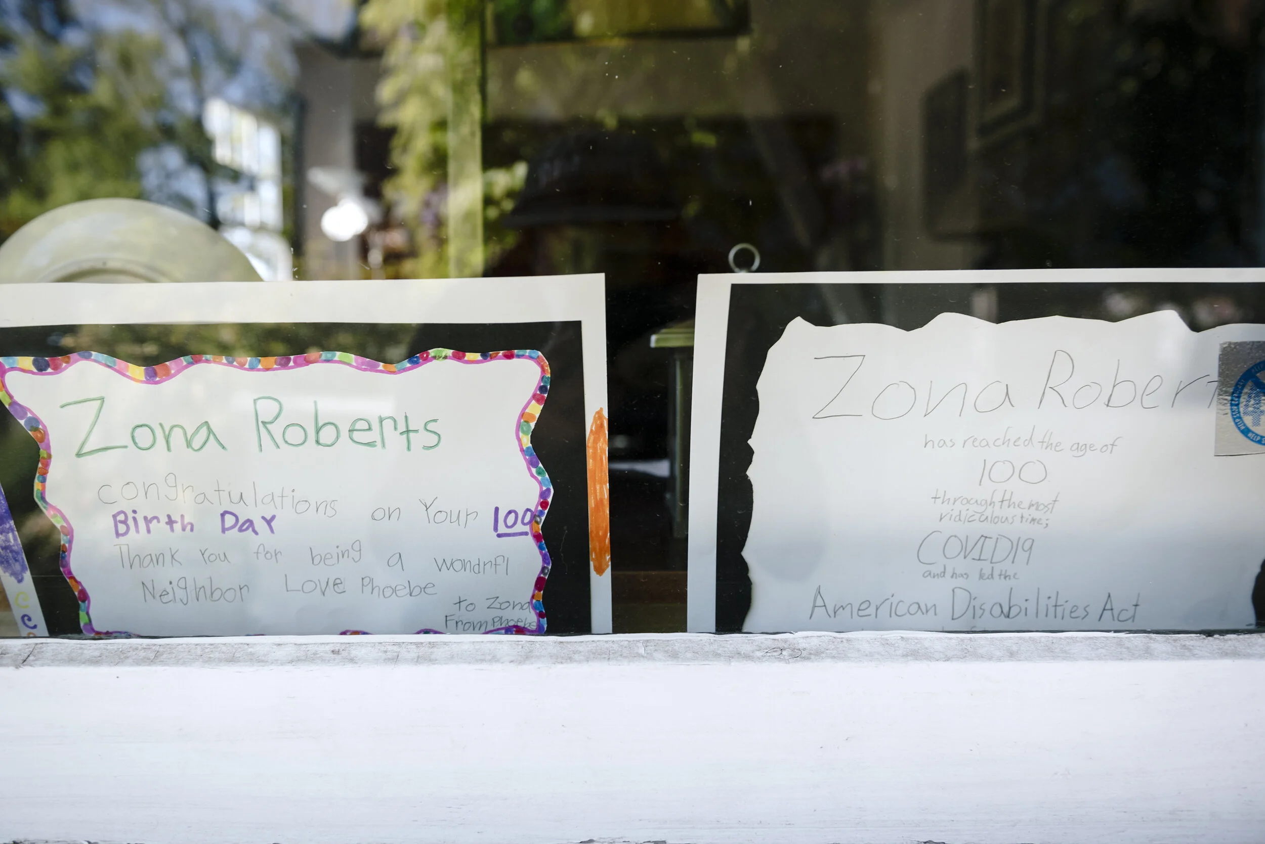  Zona Roberts turned 100.  To celebrate her friends and neighbors gathered and threw her a social distancing party outside her home in Berkeley, CA, April 1st, 2020. 