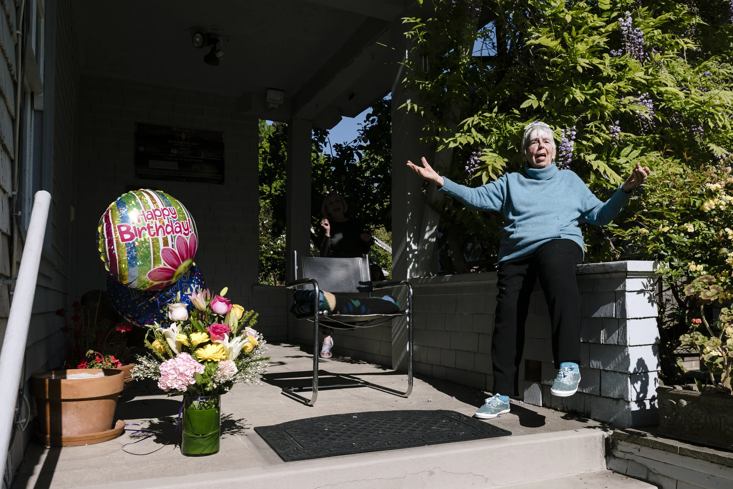  Zona Roberts turned 100.  To celebrate her friends and neighbors gathered and threw her a social distancing party outside her home in Berkeley, CA, April 1st, 2020. 