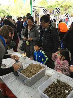 Learning_about_BioSand_Filters_at_Maker_Faire.jpg