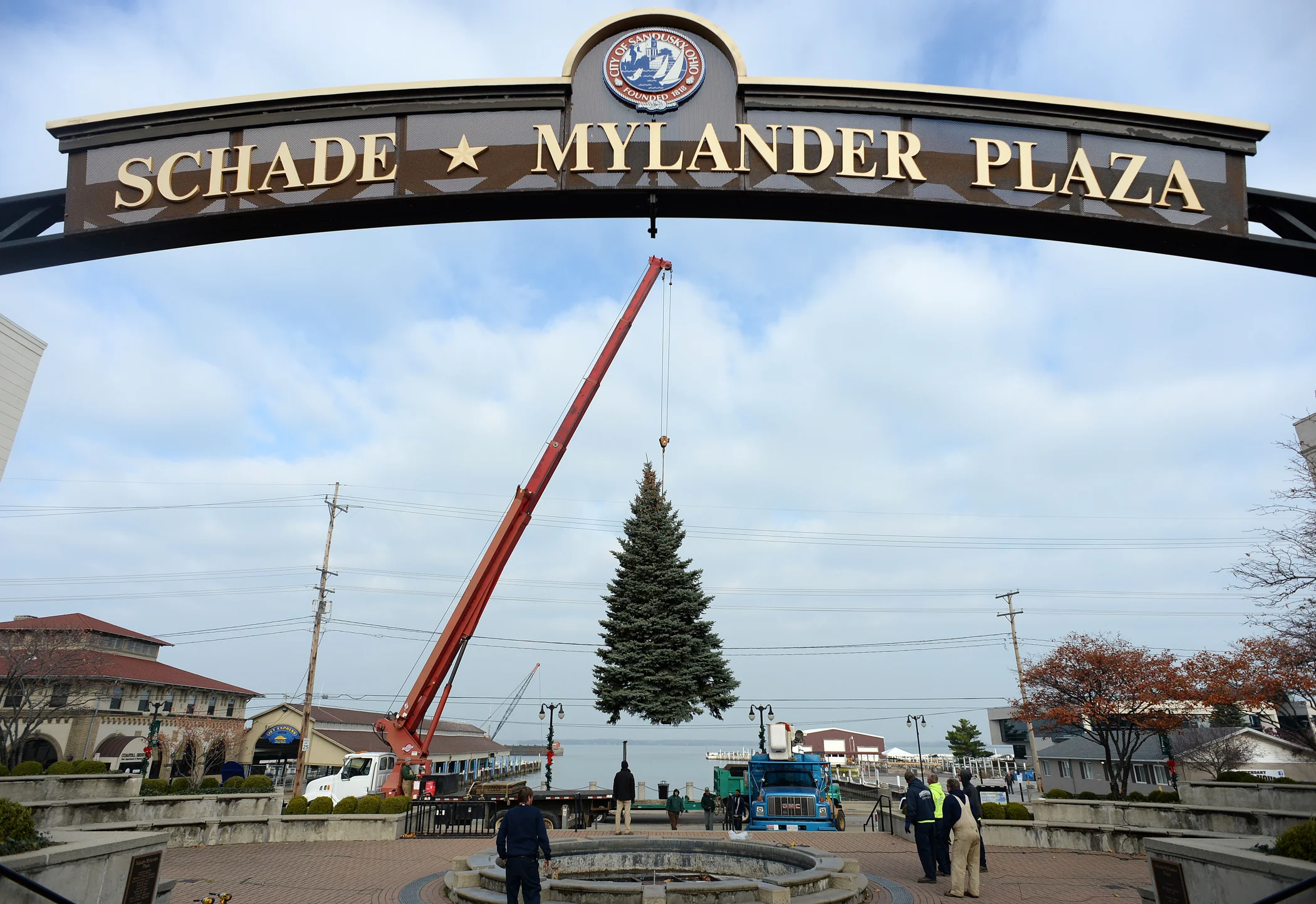  Workers from Barnes Nursery and the city of Sandusky move a tree donated by Perkins Township resident Mary Karcher to Schade-Mylander Plaza on Tuesday, Nov. 14, 2017. The blue spruce stood as Sandusky's Christmas tree for the season. 