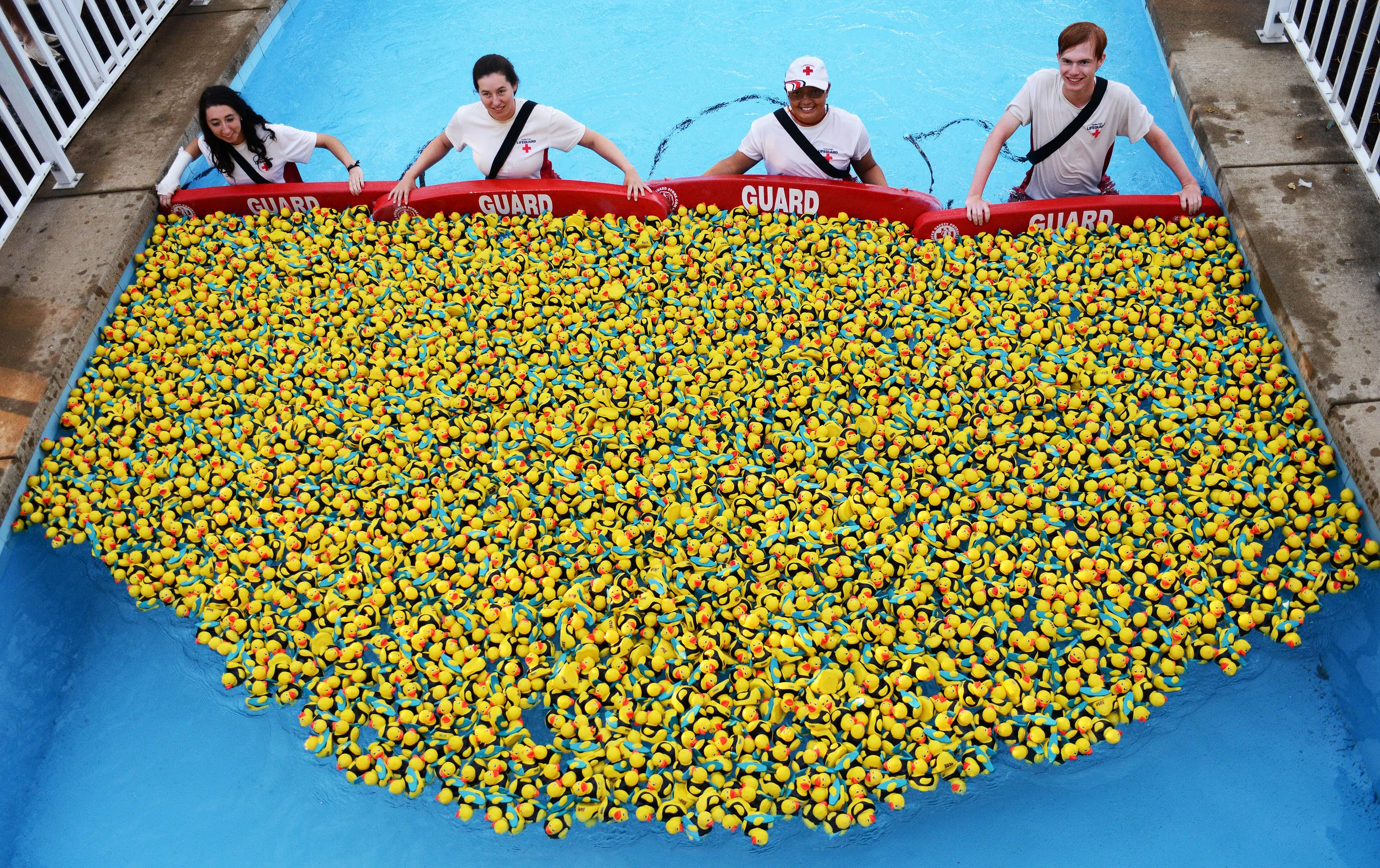  Cedar Point Shores lifeguards prepare to release the ducks down the lazy river on Friday, June 16, 2017 for United Way of Erie County's Duck Derby. The derby was the United Way's largest fundraising campaign of the year, netting nearly $50,000 for t