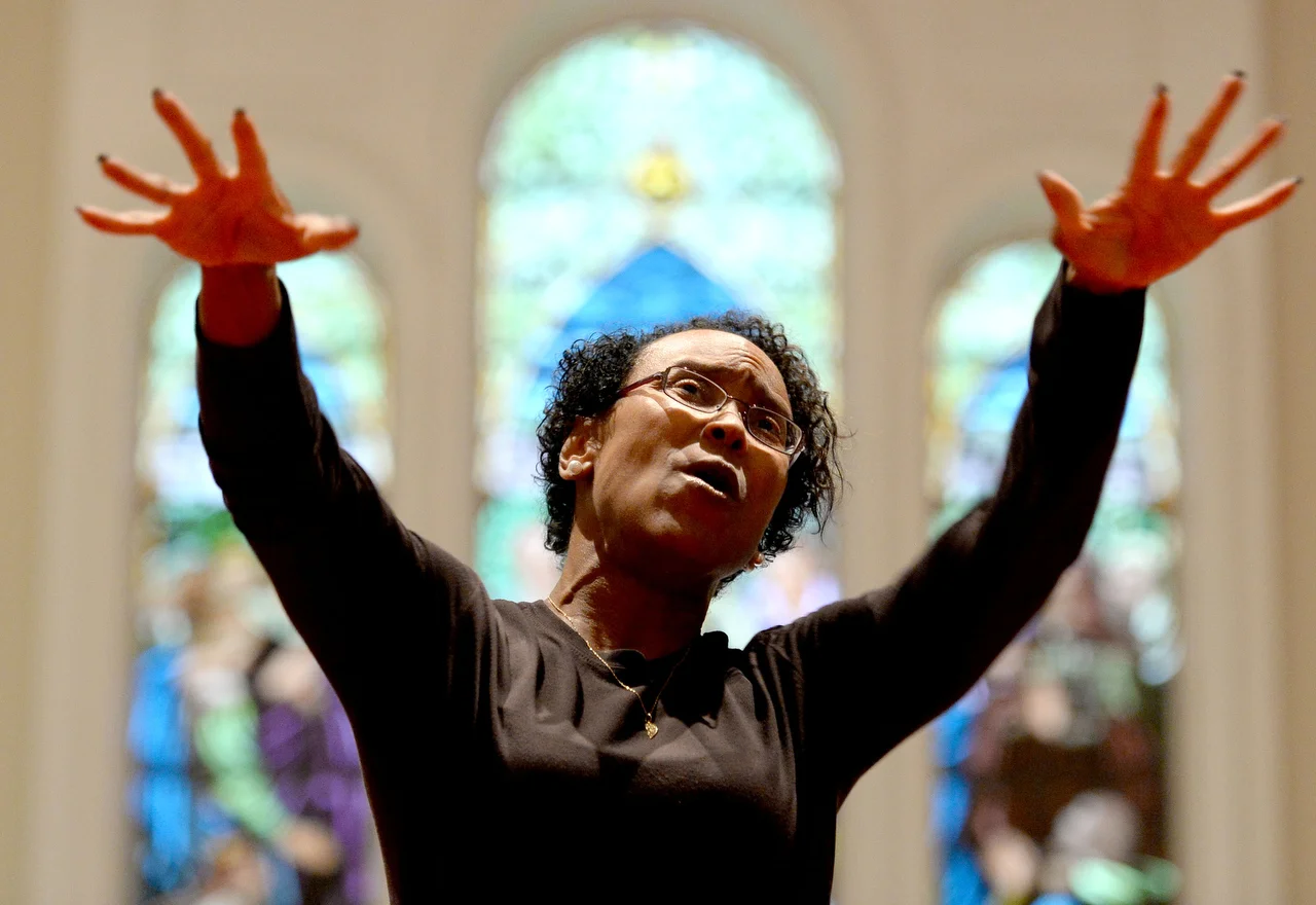  The Sandusky Choral Society's new director Heather Carmon performs during the society's practice on Monday for the upcoming Spring Concert. 