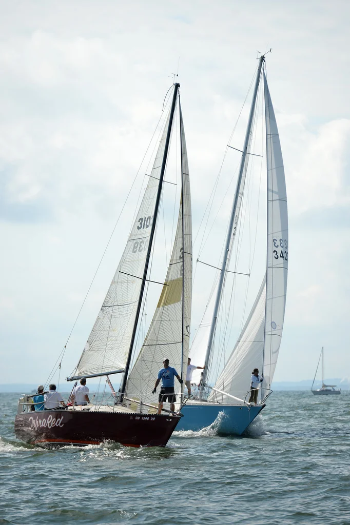  Two boats race hull-to-hull in the Sandusky Islands Race/Stein Hospice Cup on Saturday, July 8, 2017. 