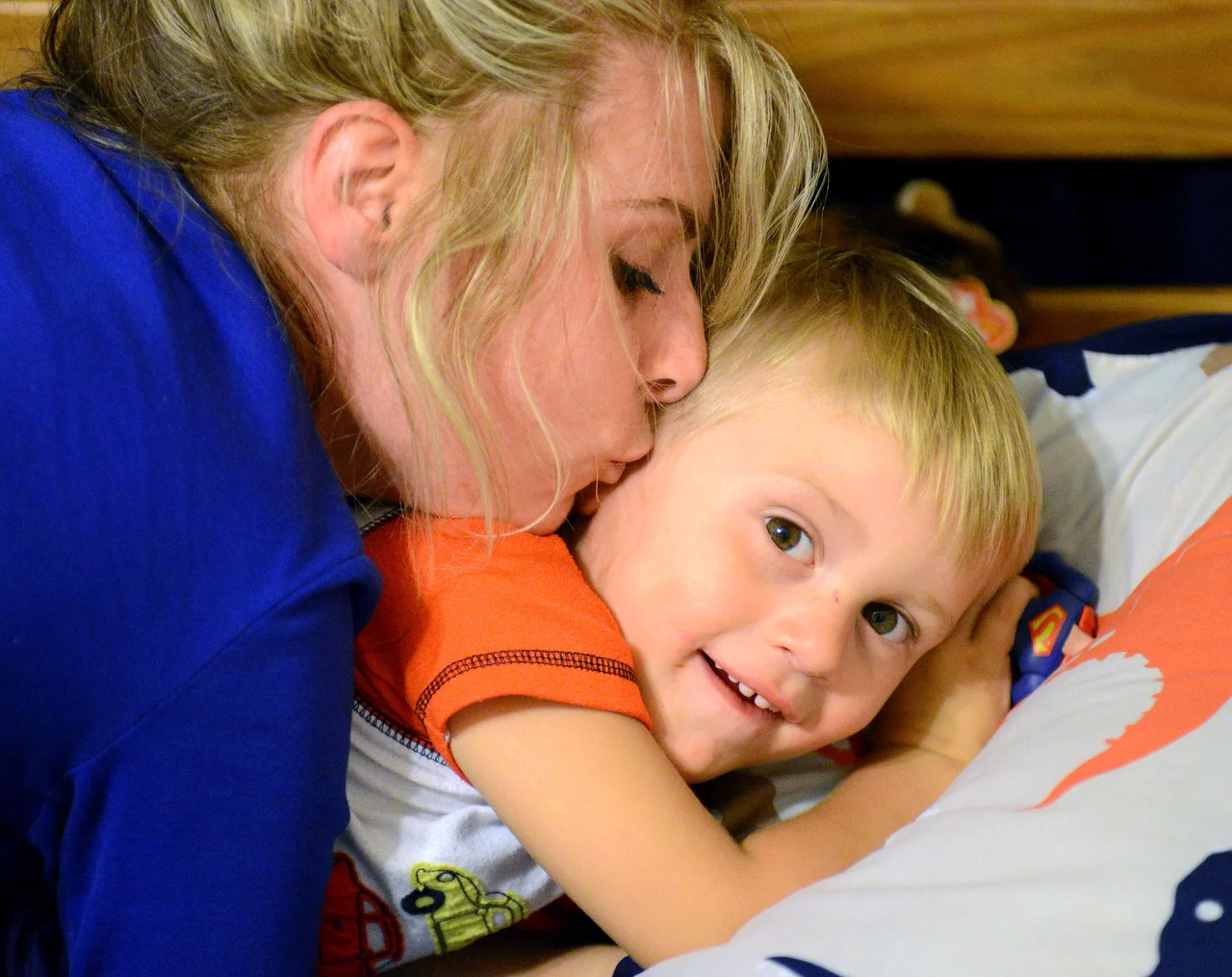  Madison kisses her son, Brenton, goodnight in their new home on Thursday. 