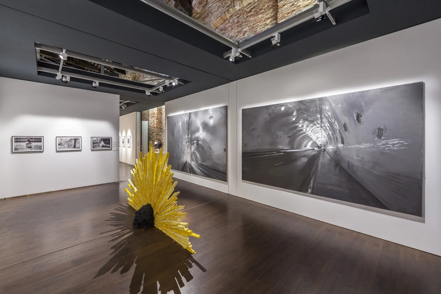 Brandy Eve Allen [left]. Jamison Carter [center, sculpture]. Frank Ryan [right, paintings].