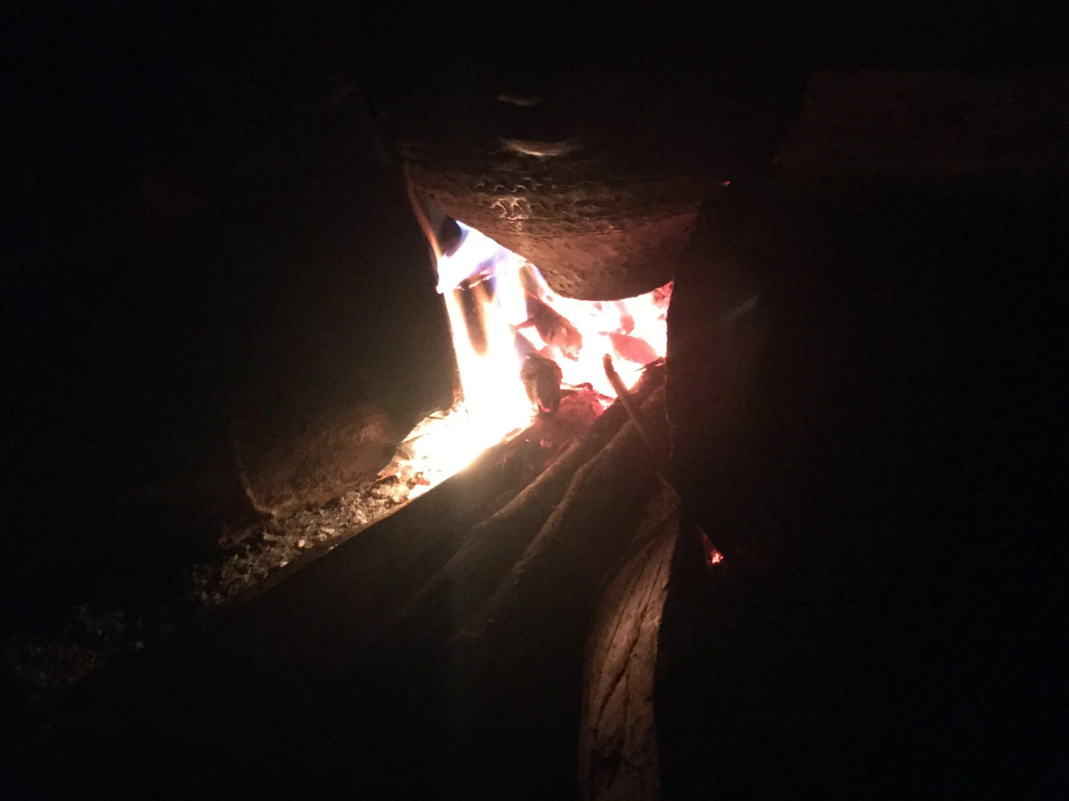 fire and ceramic pot made by Rosa, photographed during a morning Guayusa ceremony