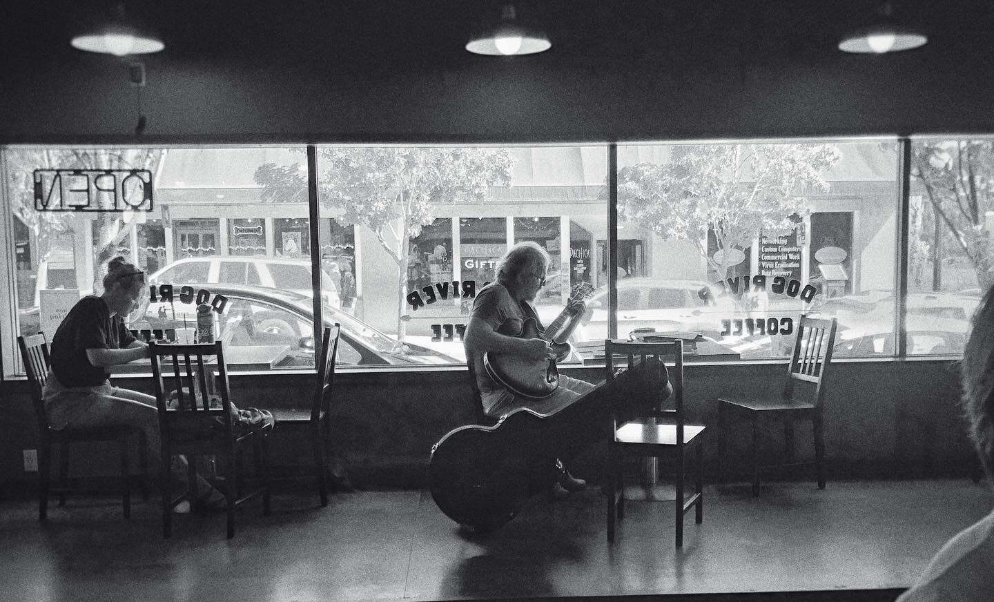 Coffee shop morning guitar practice.