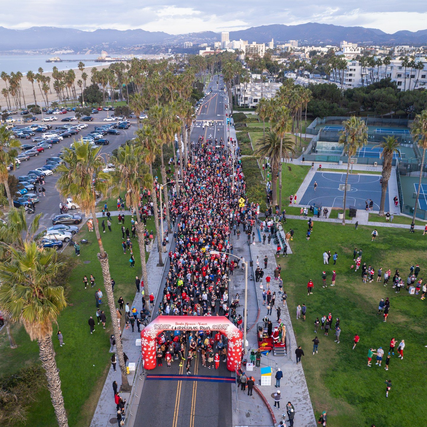 Early morning filming in Santa Monica along Venice Beach for the 47th Christmas Run, featuring an assortment of your favorite elves, gingerbread people and other festive holiday costumes.