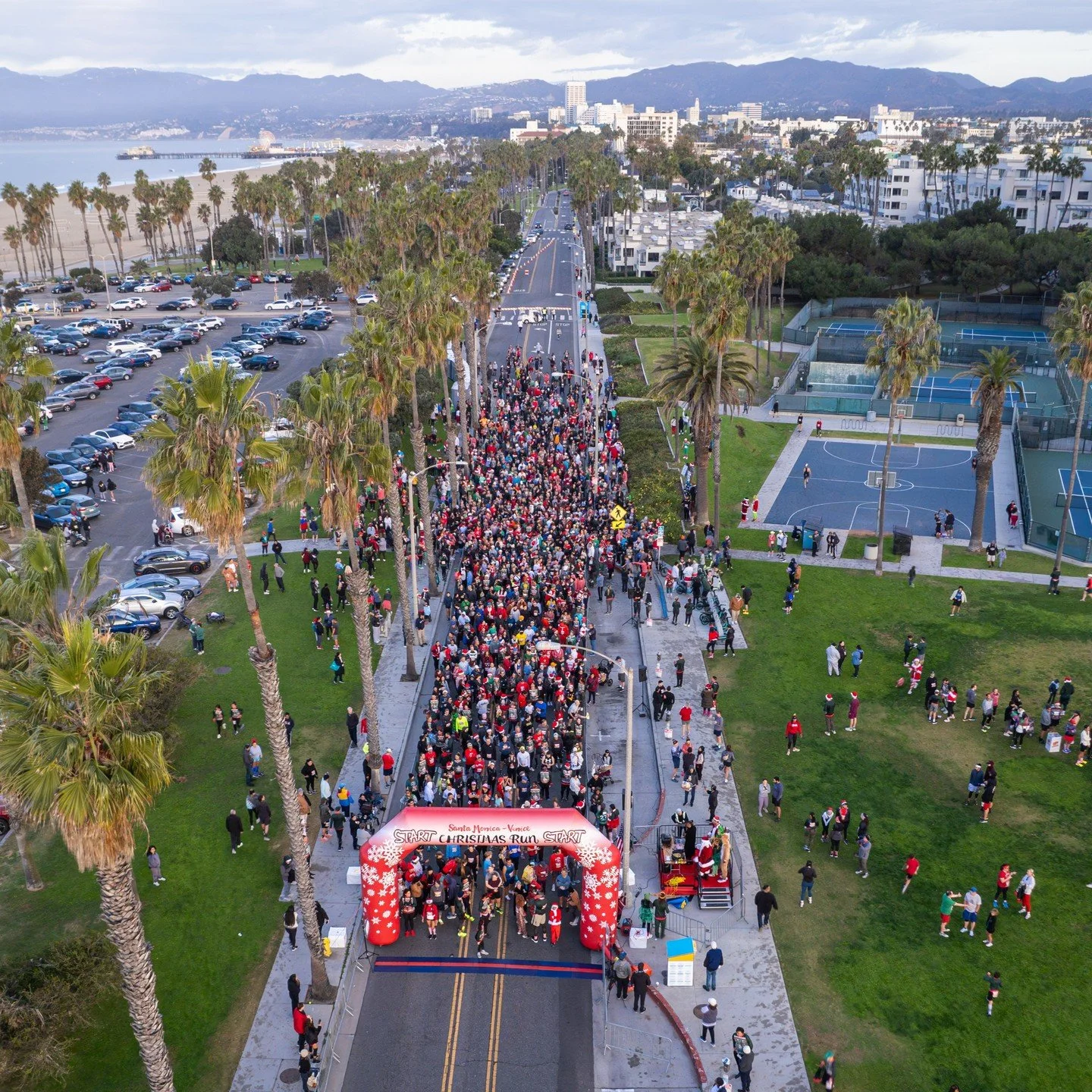 Early morning filming in Santa Monica along Venice Beach for the 47th Christmas Run, featuring an assortment of your favorite elves, gingerbread people and other festive holiday costumes.