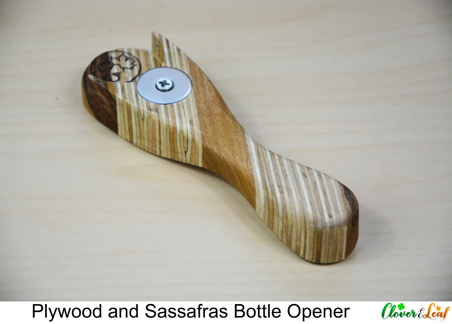 Plywood and Sassafras Bottle Opener Face Up Diagonal.jpg