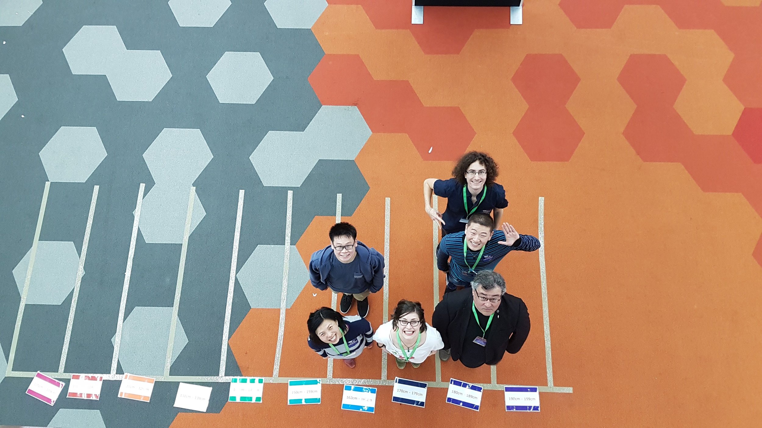 Liza (in her Statistical Bouquet t-shirt) and team form a human histogram at the Incredible Science event