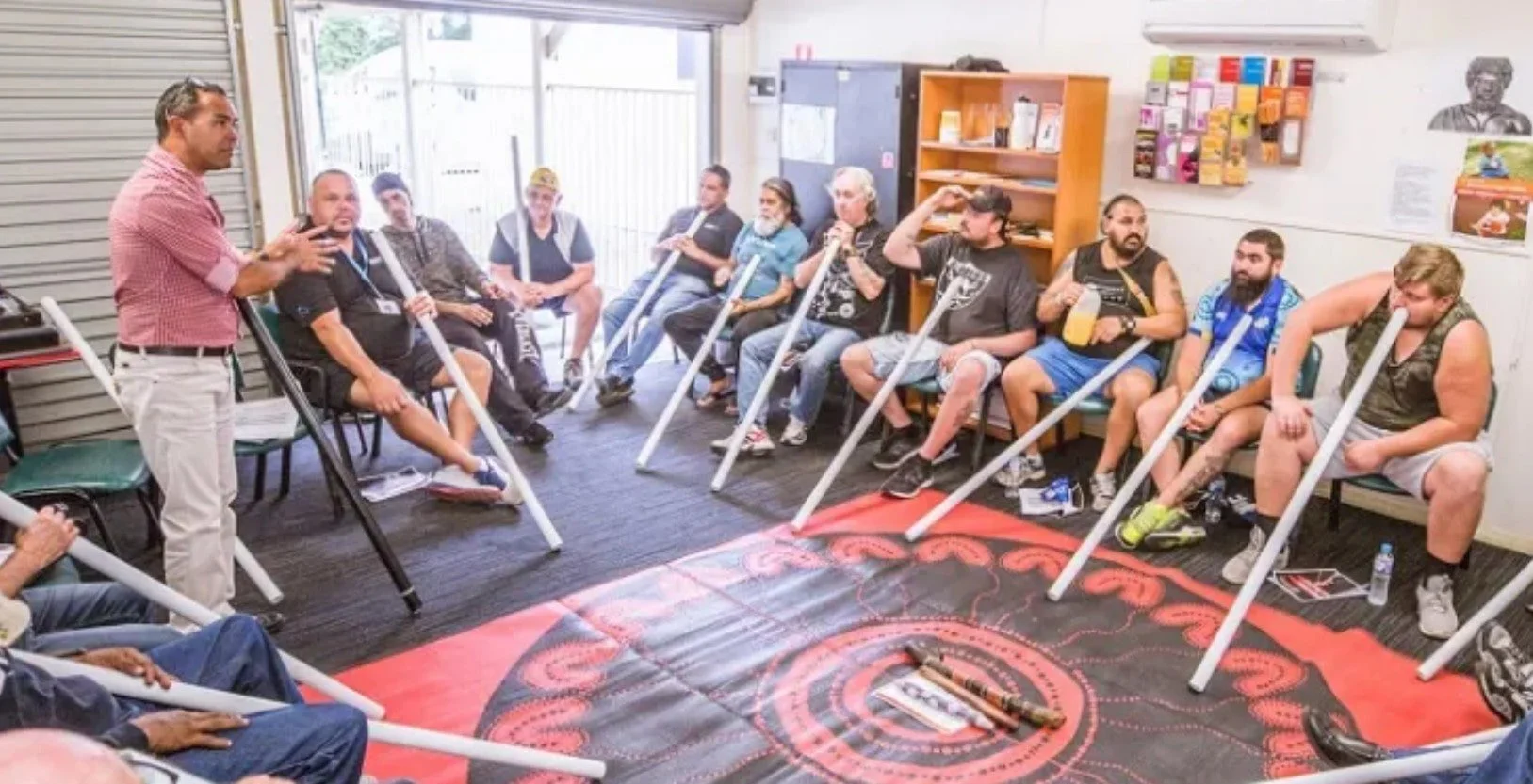 Hire First Nation rhythm teacher Melbourne Sydney Brisbane | LEARN YIDAKI – YIDAKI WORKSHOPS traditional didgeridoo show