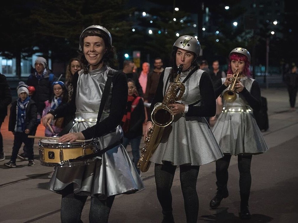 CHAOS MAGNET roving festival performers with live music and circus skills