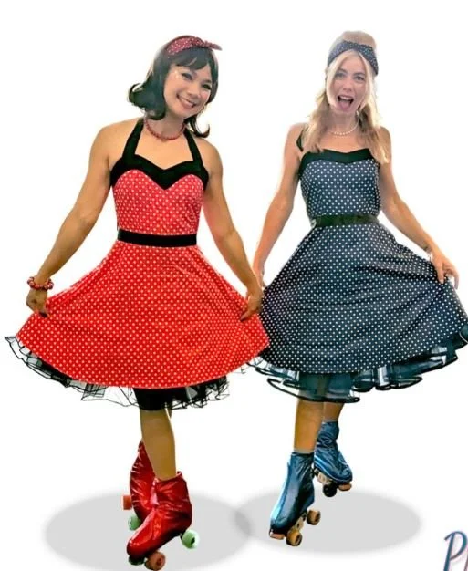 Hire Christmas entertainment Melbourne | BELLE festive roller performer with themed costumes | Artist Bookings