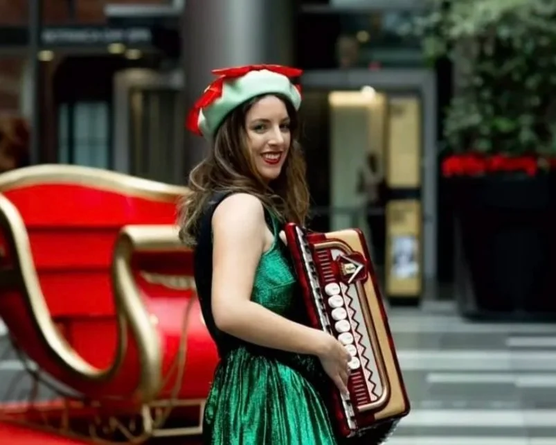 LUCY MELBOURNE CHRISTMAS PIANO ACCORDIONIST FESTIVE EVENT HIRE