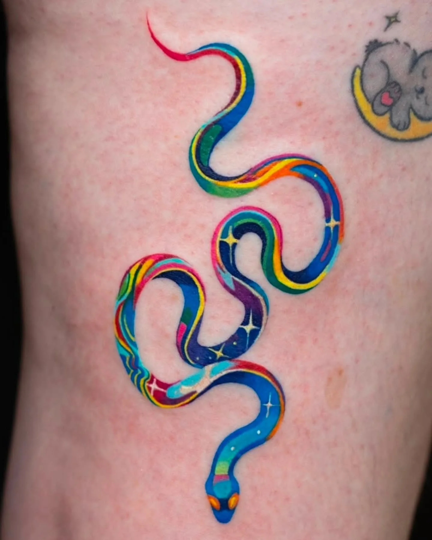 Colorful starry snake 🐍 by @heeyajenny 
Books open!
.
.
#tattoo #vancouvertattoo #vancouverart #snaketattoo #colortattoo #vancouvertattooartist #yvr