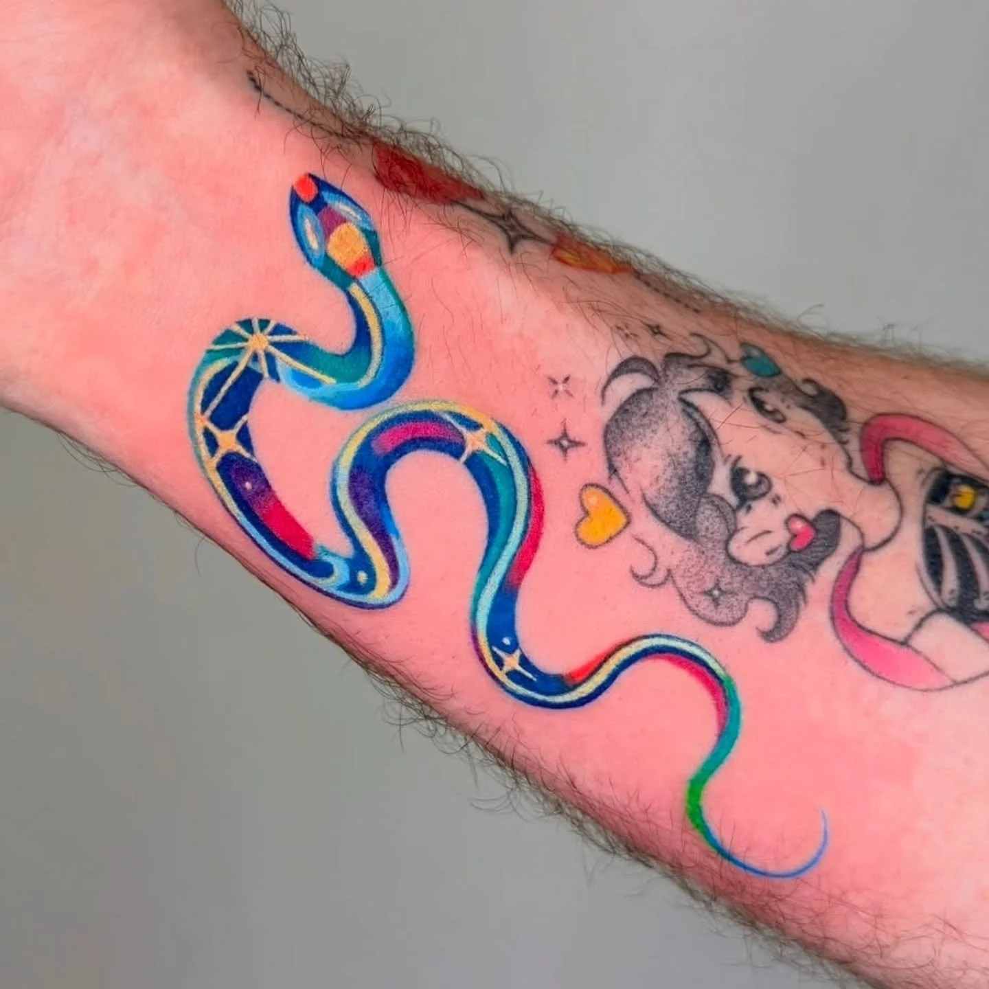 Shining colorful Snake ✨️ by @heeyajenny 
Booking available 
.
Upcoming: Spring Equinox Drawing Night in March! (TBA) 
.
.
#tattoo #snaketattoo #colortattoo #vancouvertattoo #vancouverart