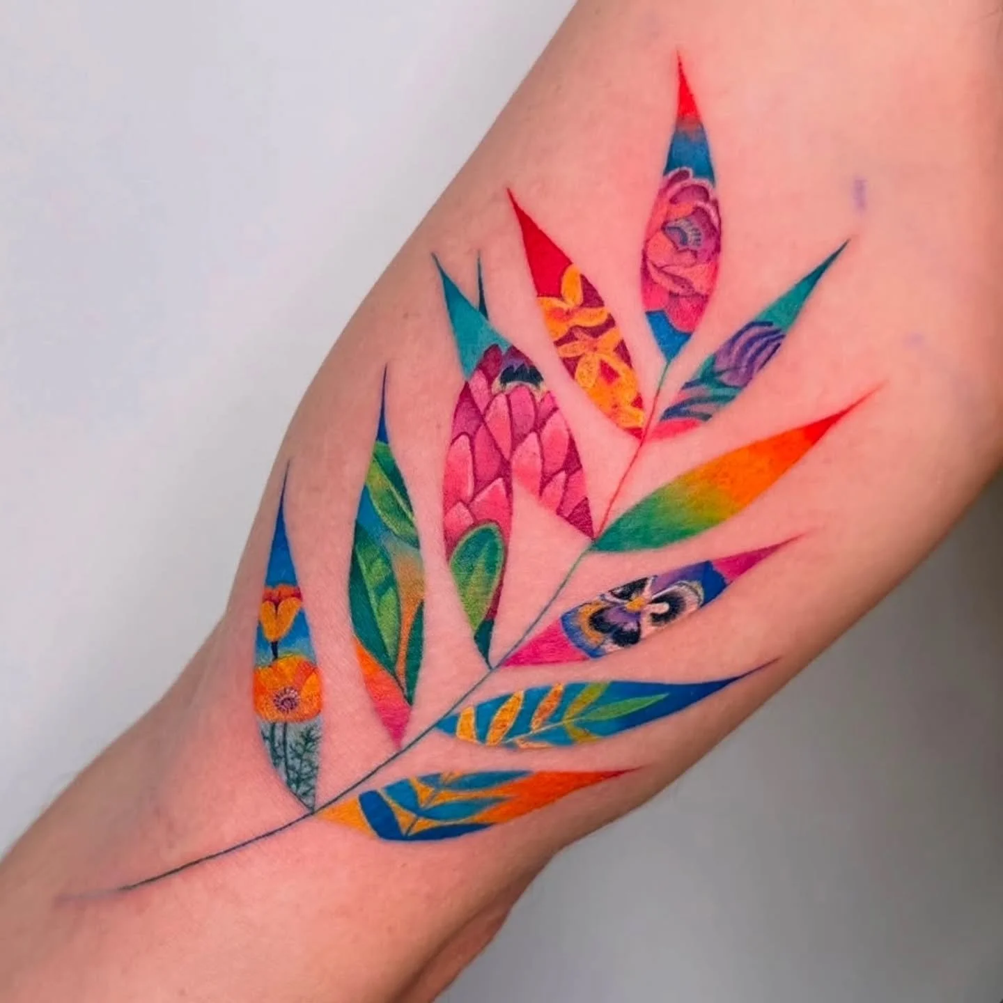 Colorful flower patterns in leaf 🌿 by @heeyajenny 
Booking available 
.
Upcoming: Music Flash Day, April 18 (details coming soon!)
.
.
#tattoo #vancouvertattoo #colortattoo #flowers #vancouvertattooartist