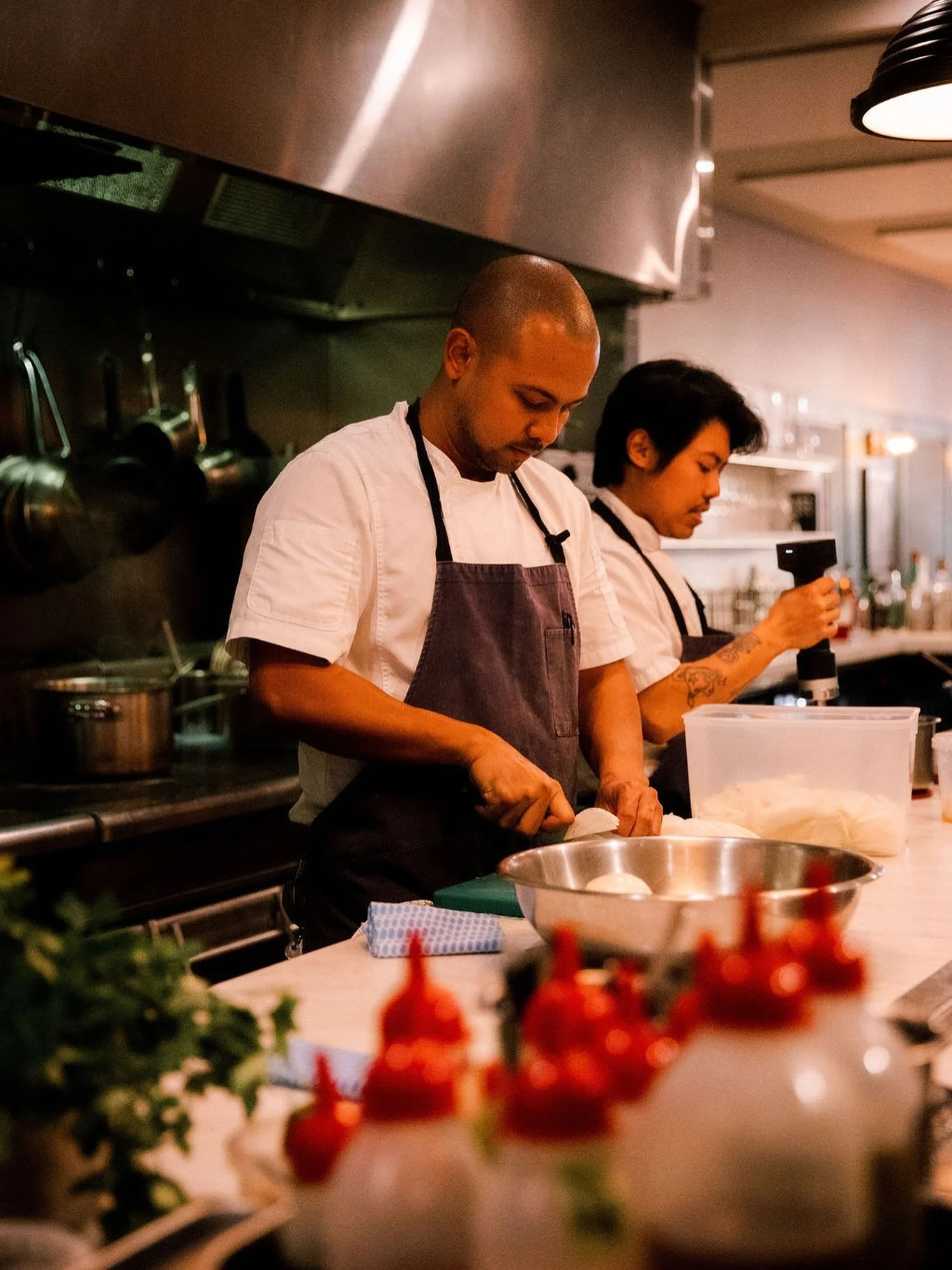 What happens behind the pass is equal parts precision and passion. Every sauce stirred, every plate placed, every detail considered.