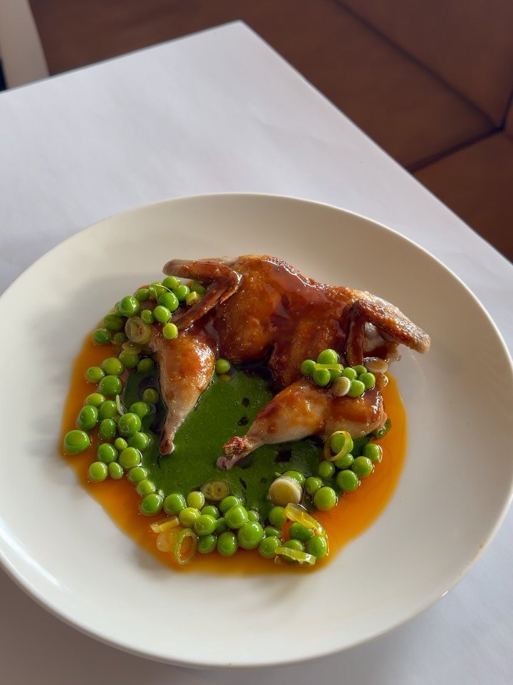 Pan roasted quail with winter hand picked garden peas till the season ends. Along side a Tuscan kale &amp; quail dripping sauce. Gently poached peas with the perfect amount of texture, green shallot and lemon zest.