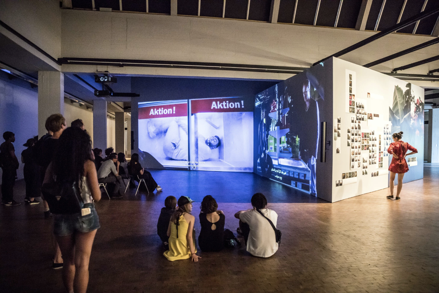 The German artist Mario Pfeifer’s video installation “Again” casts a bitter eye on Germany’s refugee crisis.CreditGordon Welters for The New York Times