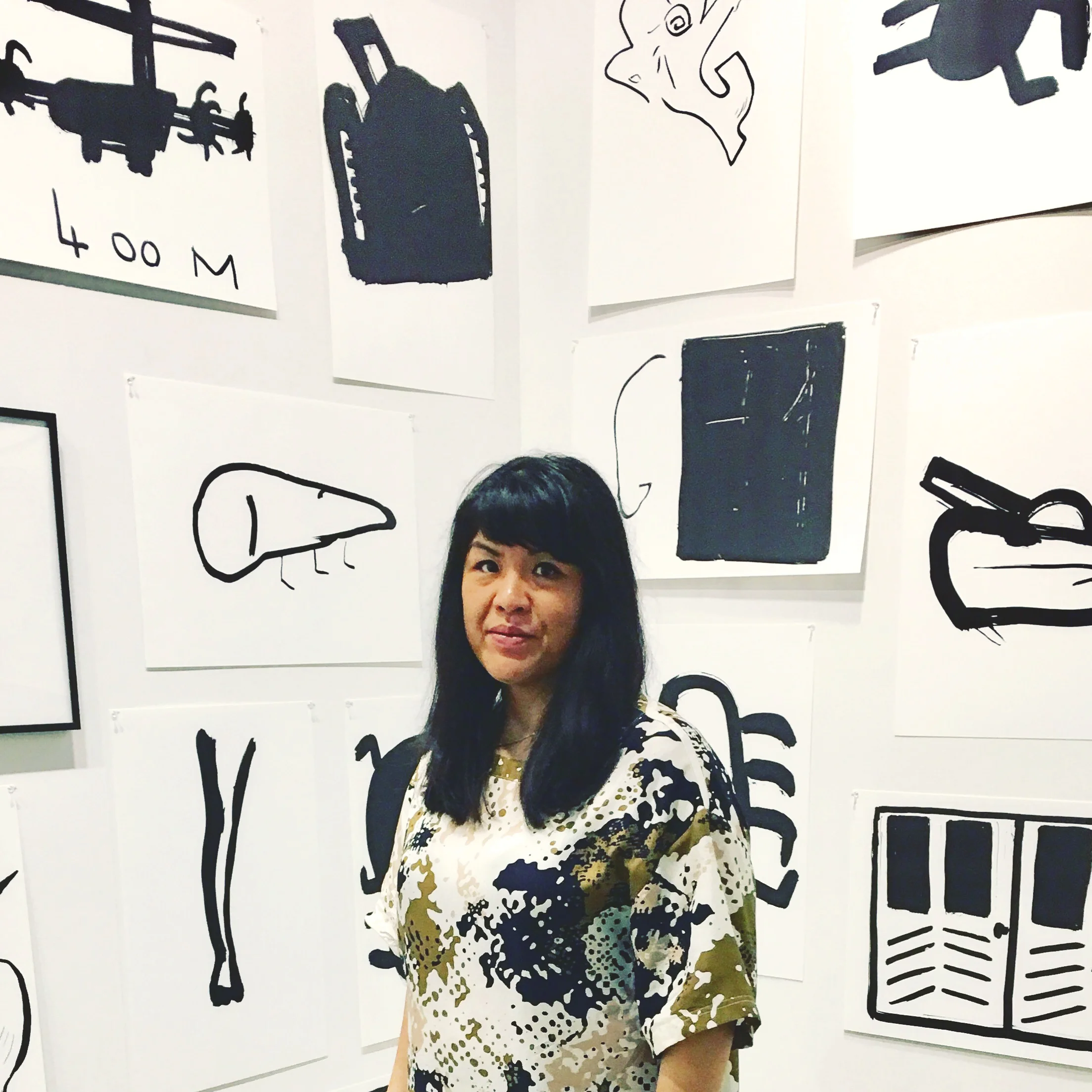 Kristine Go - Owner / Creative Director