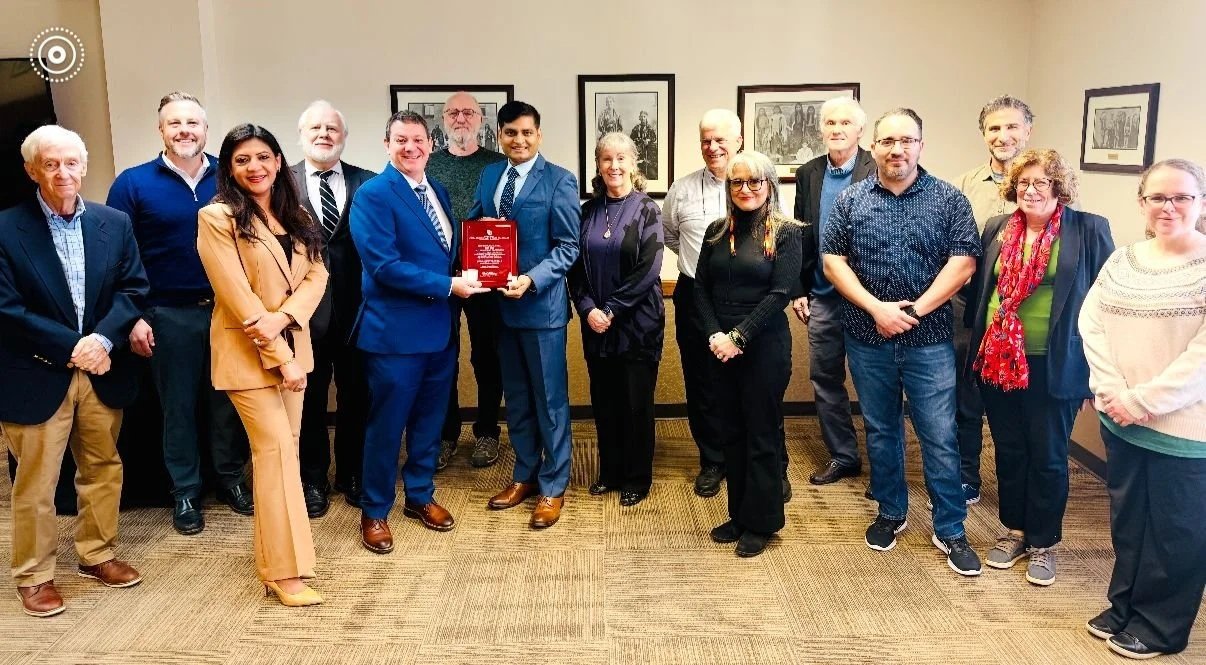 Dr. Sharma winning the Kinney Sugg Outstanding Professor Award