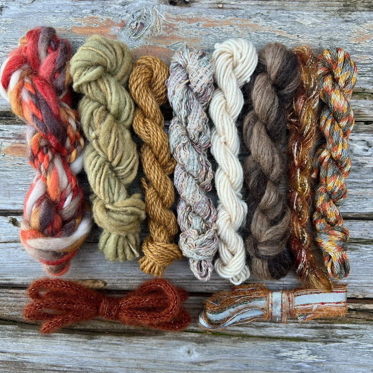 🧶 'Canyon' weaving fibre pack with 8 assorted yarns (68 yards total), 1 mohair i-cord, and 1 silk ribbon in a warm colour palette of burnt orange, sand, golden yellow, brown, cream, gold, caramel, and khaki. 

♻️ Featuring a variety of vintage, upcy