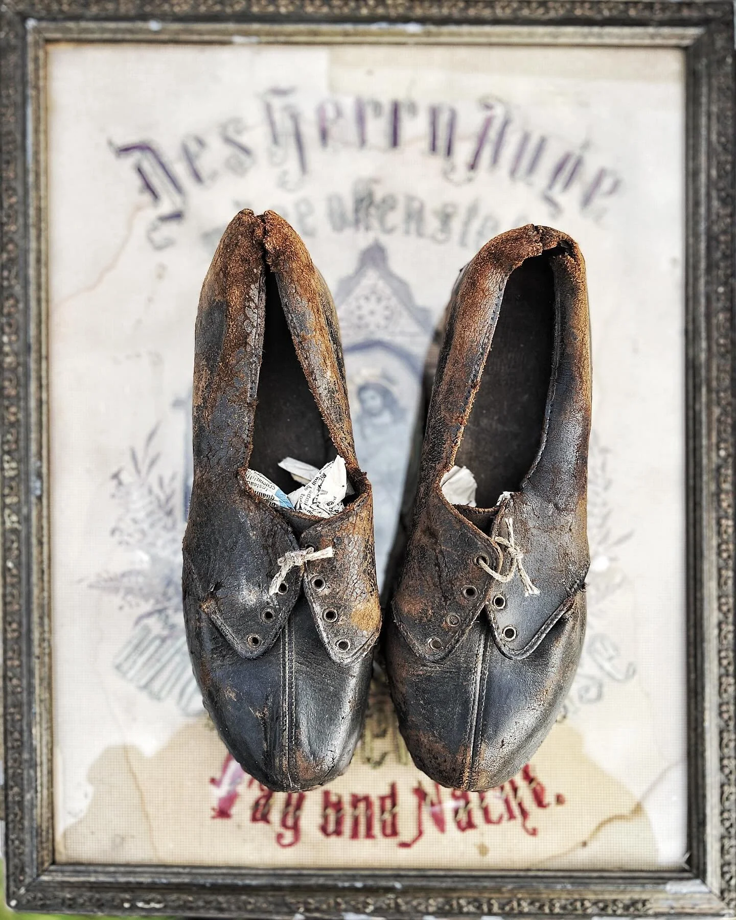 Out Sourcing. Not purchased but admired!  What a story they must tell.  #oldshoes #weatheredandworn  #historystandsstill #shoes #vintageshoes  #georgeandbeth  #iwonder