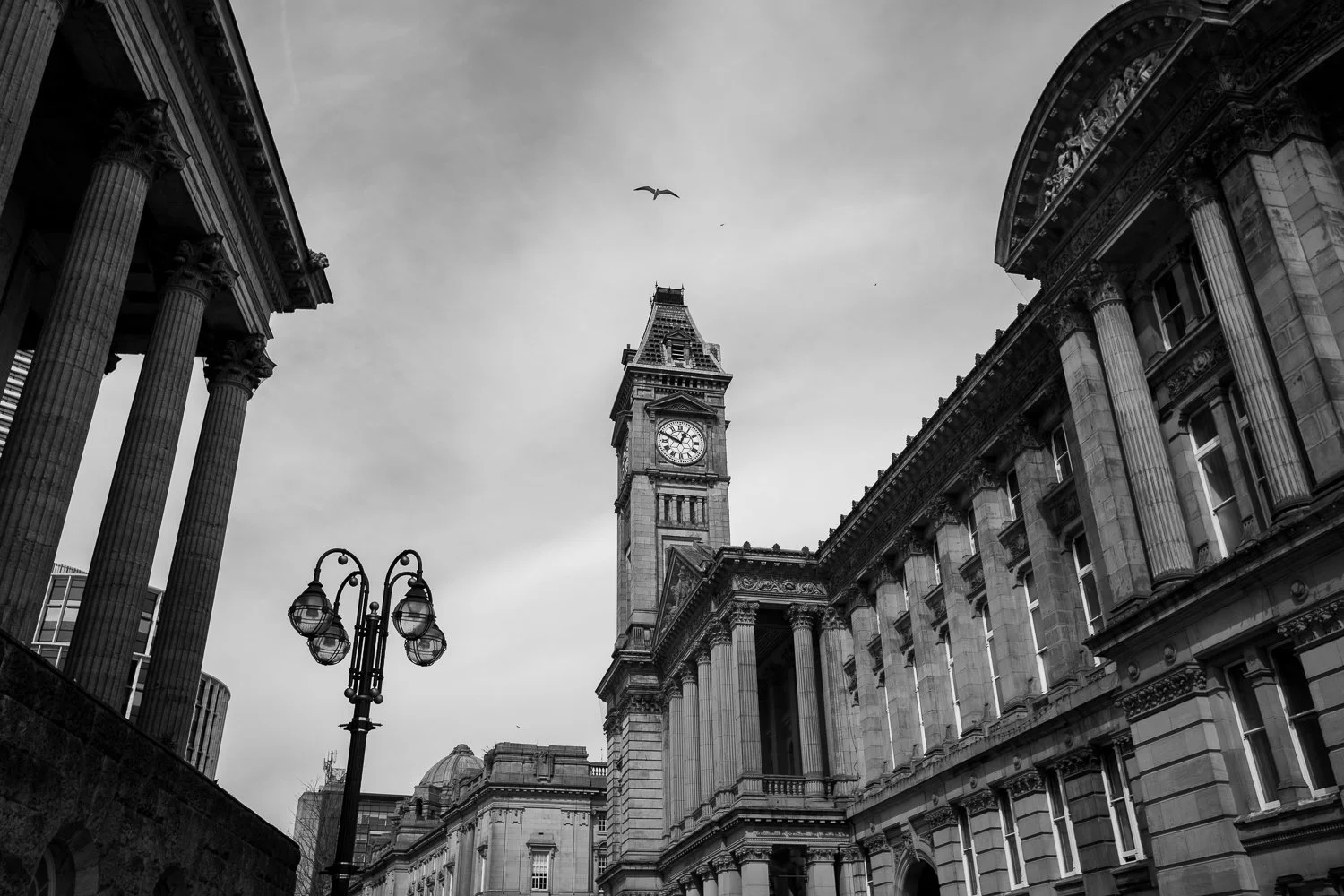 Black and white photo of The Clock Tower at the Old Town Hall, Victoria Square, Birmingham, showing detailed historic architecture and classical design.