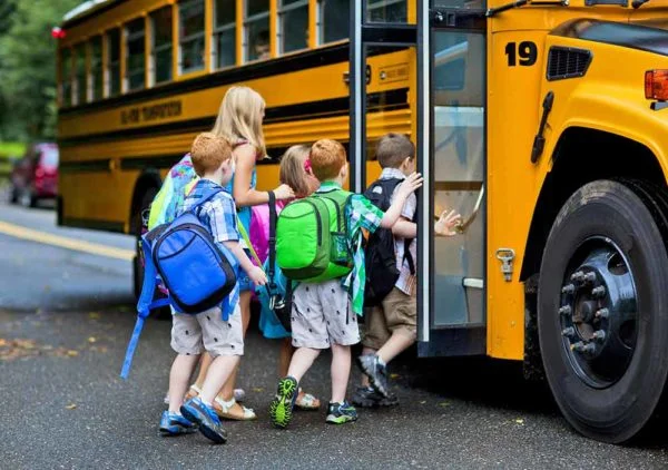 kids-getting-on-the-school-bus-small-2-600x422.jpg