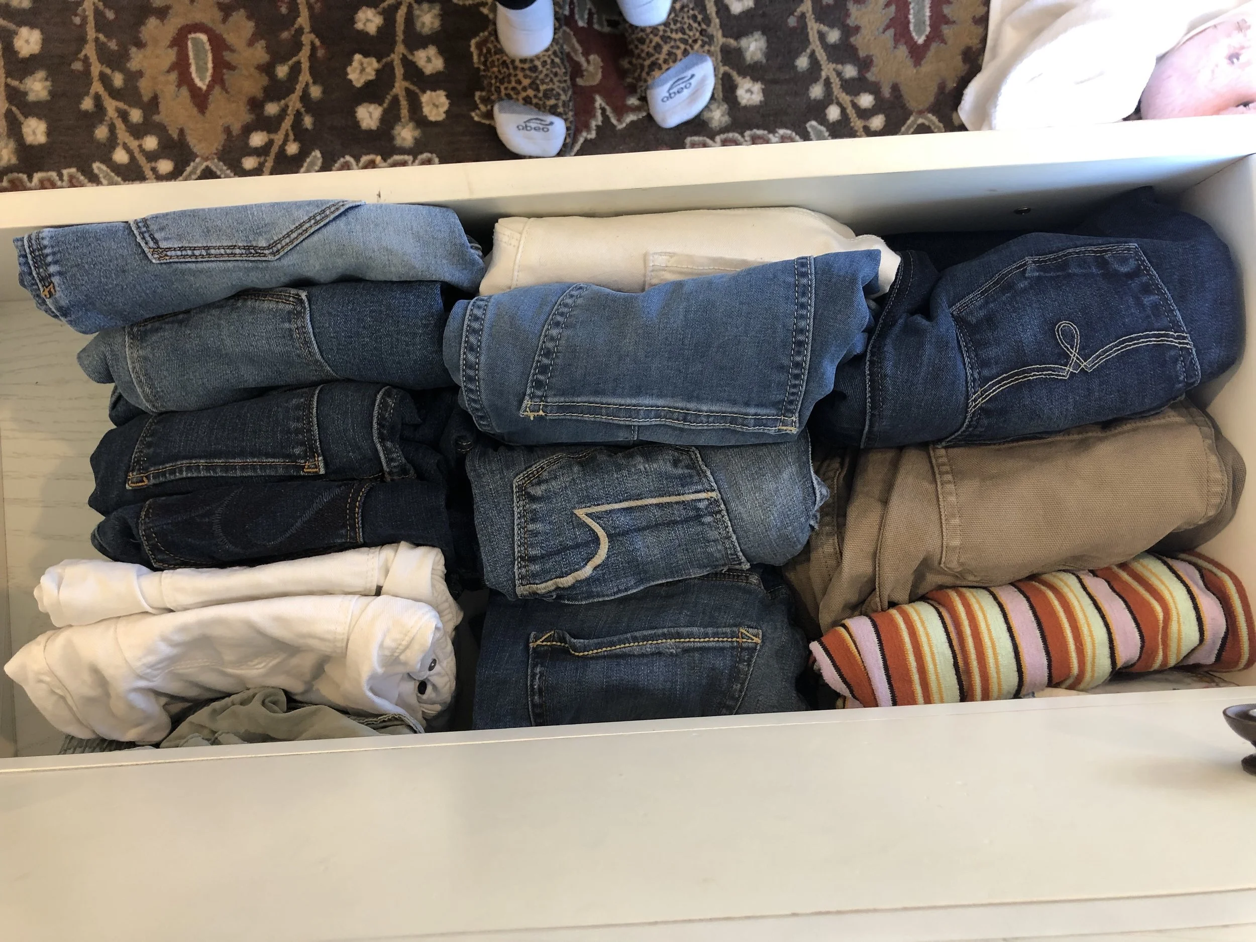This is a pants drawer from above, and also my feet! They keep photobombing me!