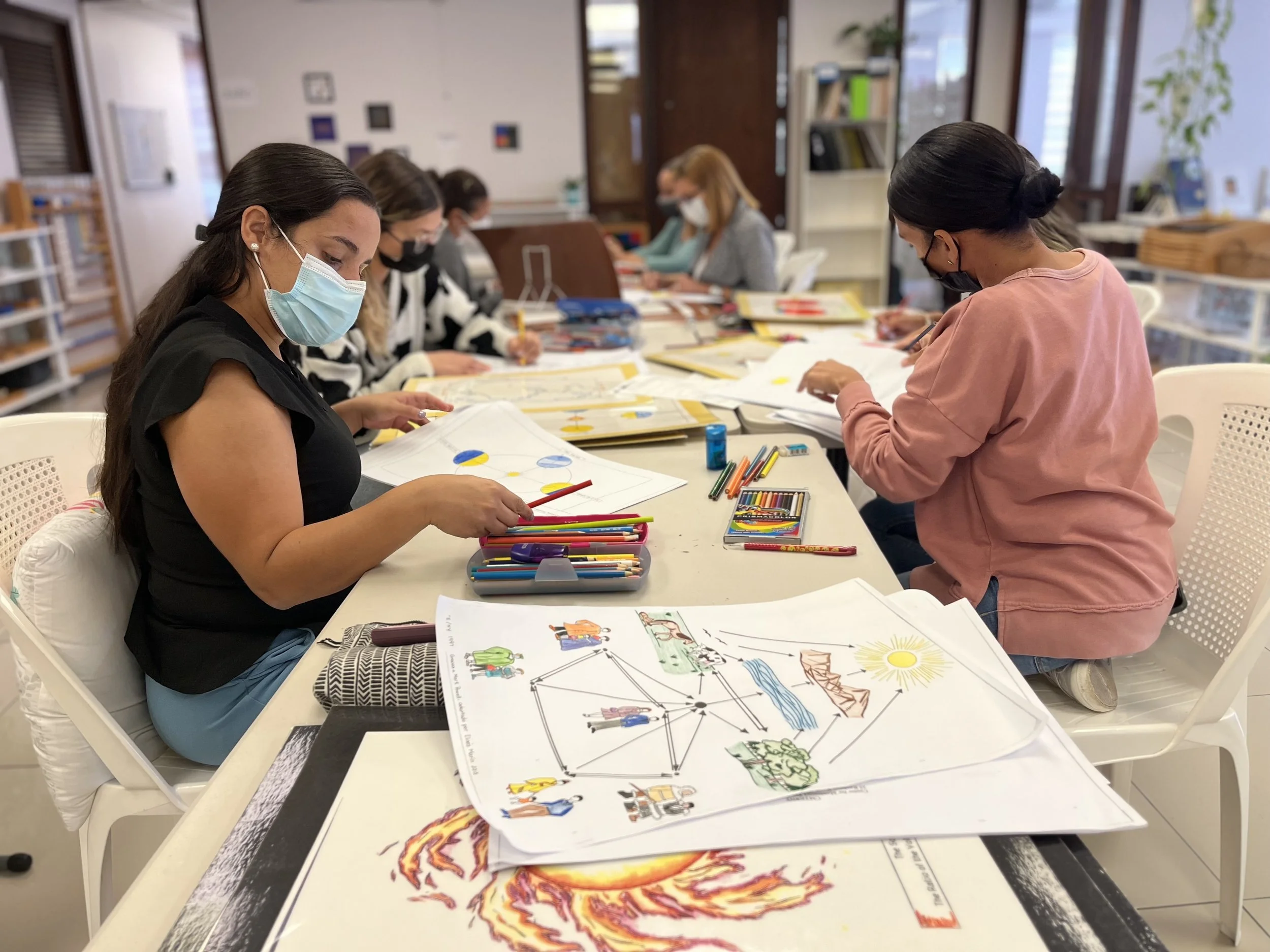 Adult apprentices take their material building workshops