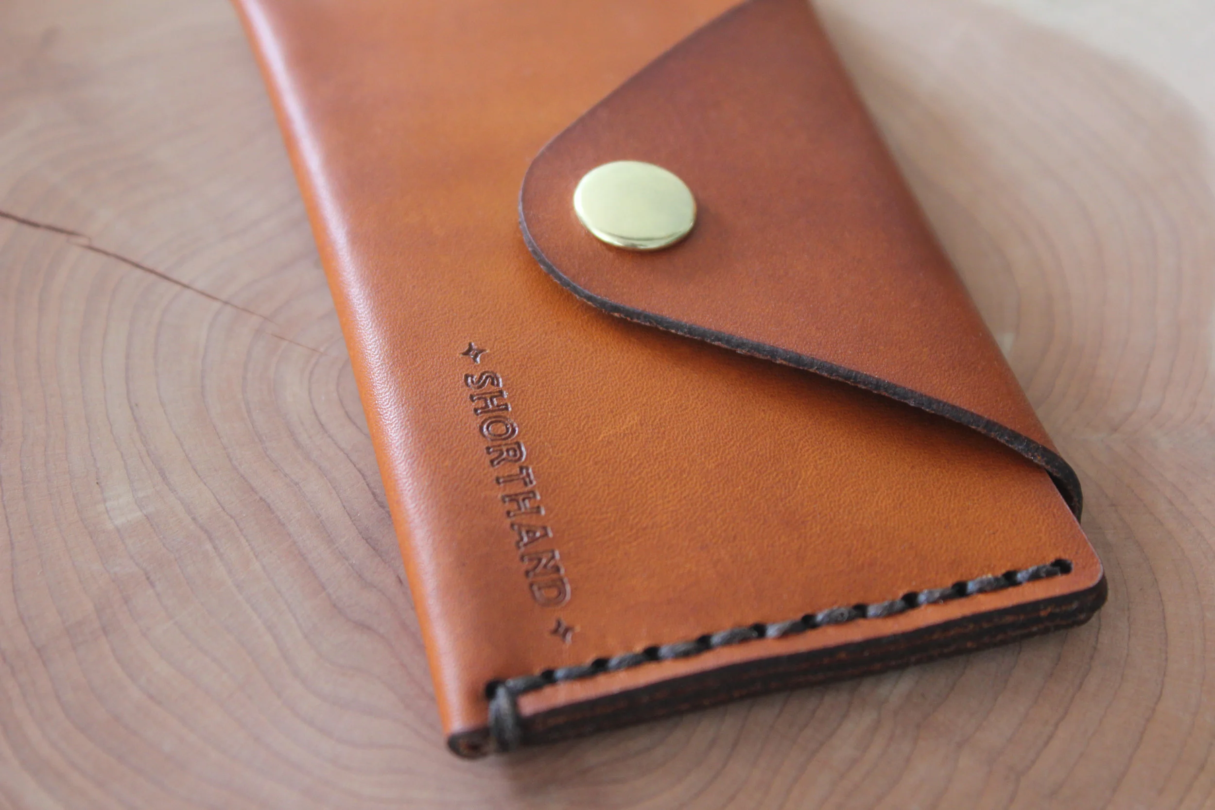 shorthand_short_hand_saw_mill_sawmill_wood_work_woodwork_craftsman_bar_table_cincinnati_ohio_camp_springs_kentucky_ky_south_southern_grain_trees_slab_slabs_patrick_pat_dewenter_design_print_nku_sinclair_mason_leather_stitch_wallet_work_brass_quality_2.jpg