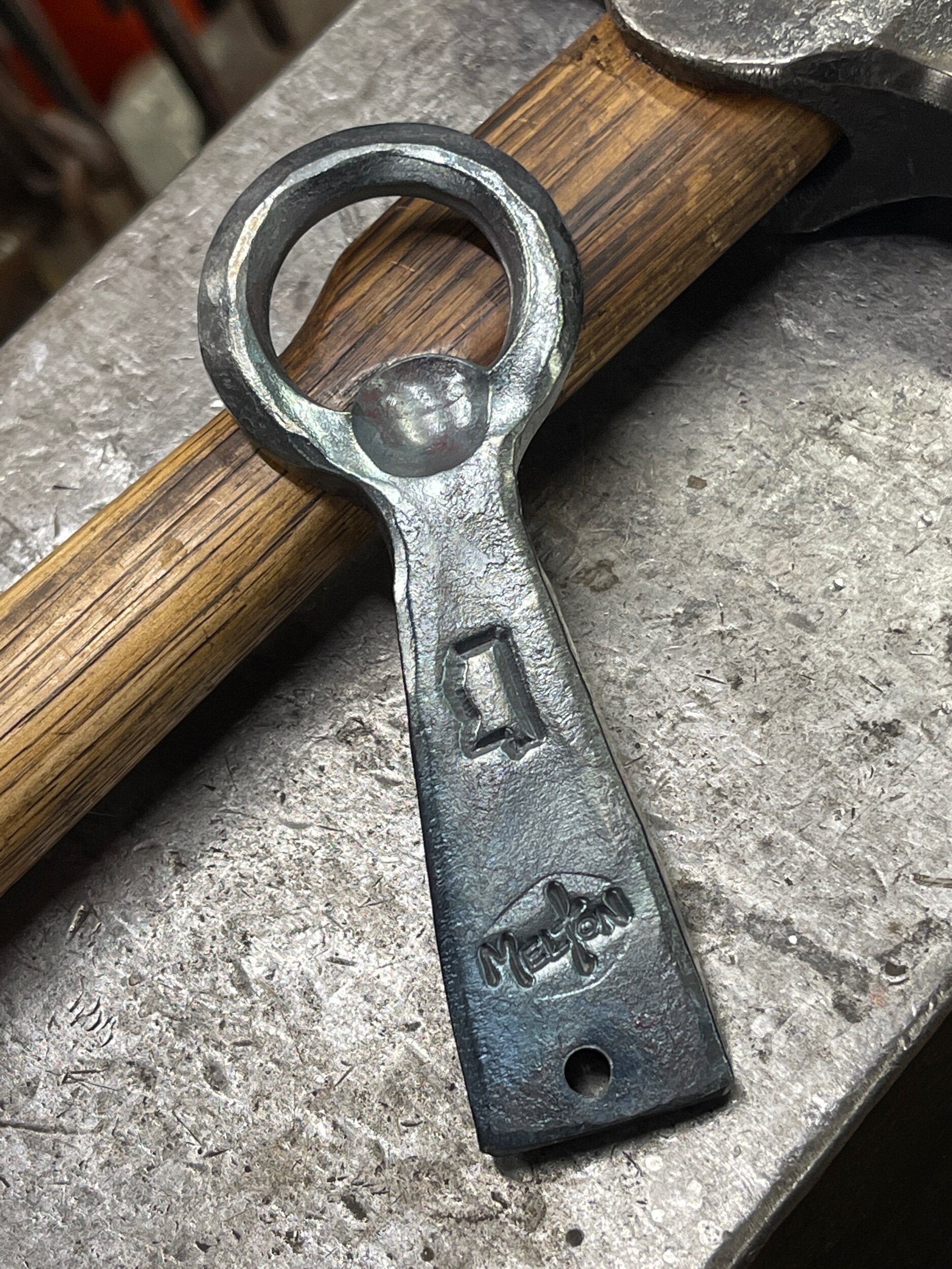 Hand forged bottle opener