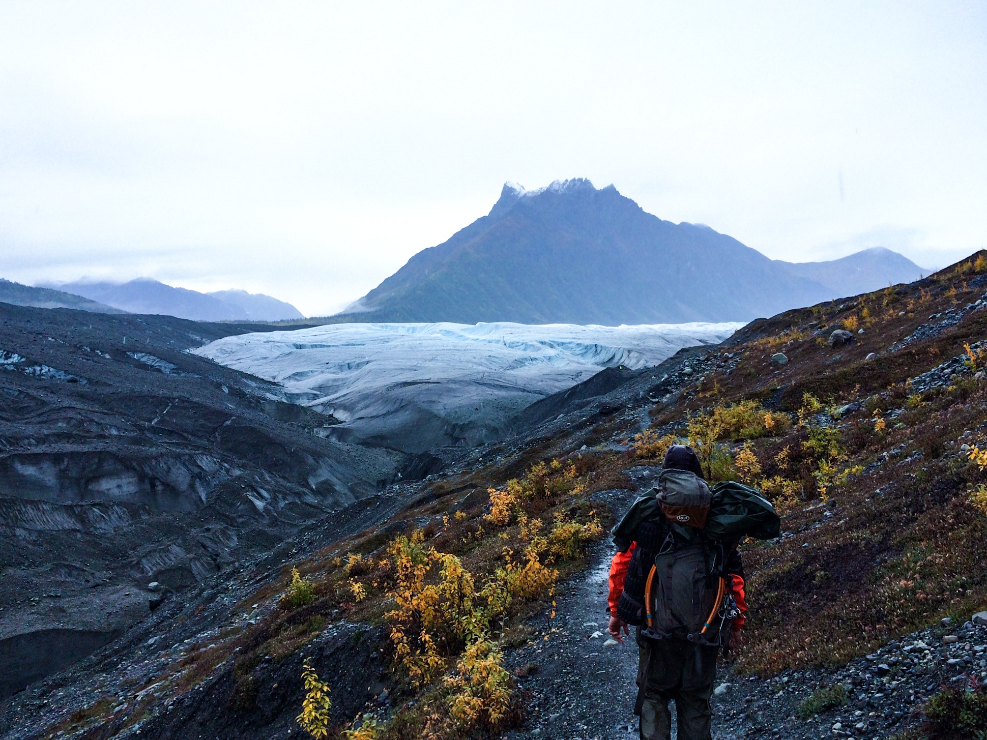 pending ice climb in a glacier 