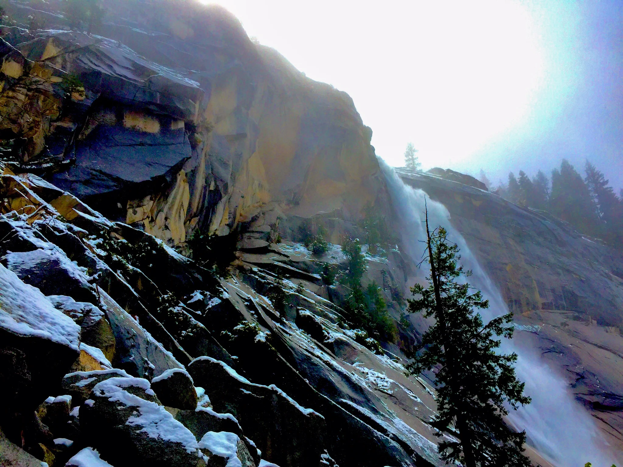 a rare view of nevada falls with snow