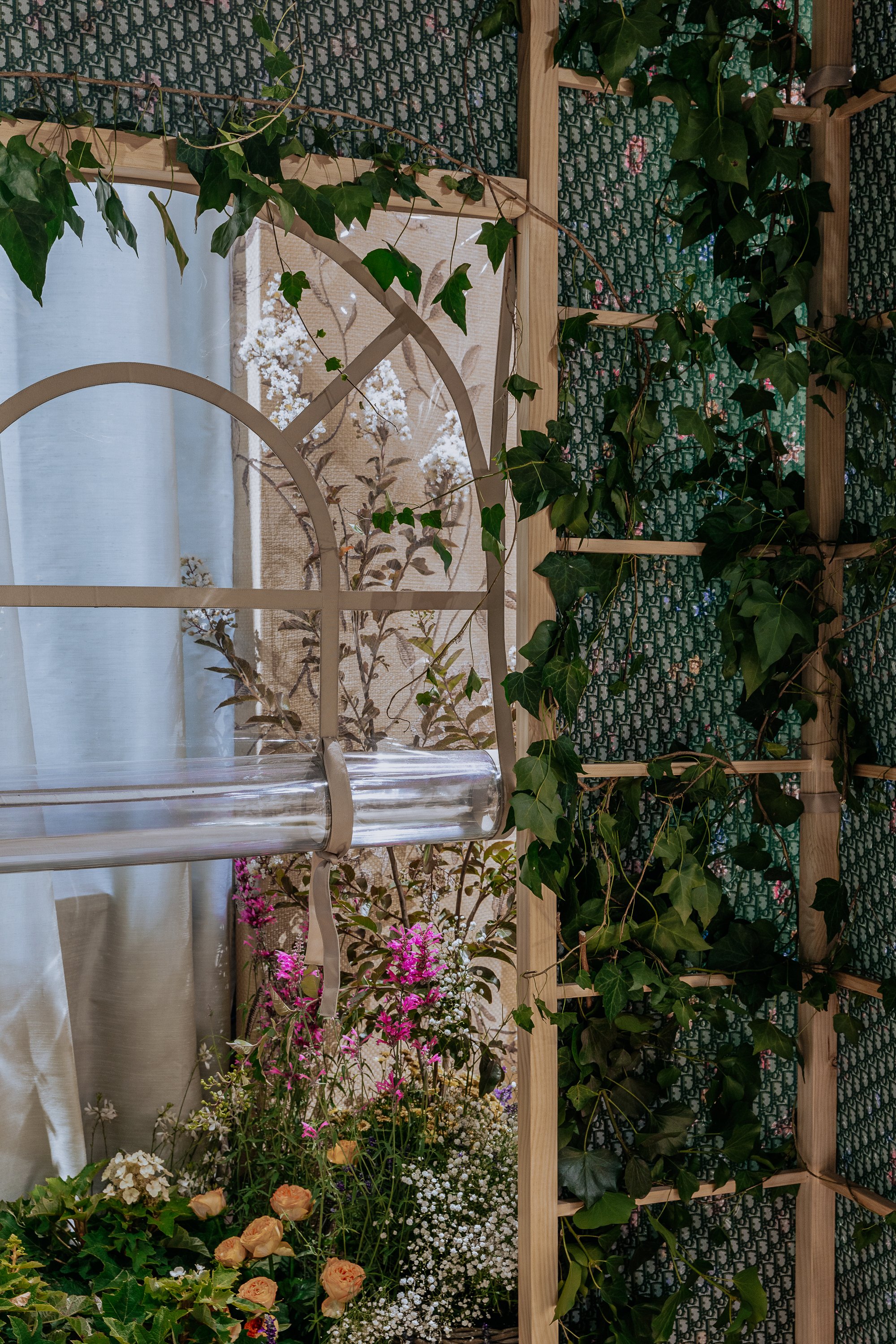 Close-up of Dior Pergola with the Bespoke planting design peeking through