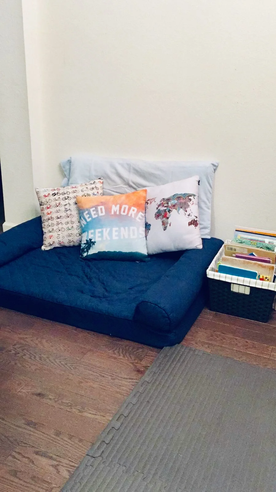 Reading (Relax area): This space is very nice and actually invites the child to read. If the books and a nice comfy space is available for them, they will use it more and be more interesting in reading or ask for a story. It could also be a good place for calm down when children need a “time out” . I personally don’t like the time out concept, but I think it is nice to create a nice beautiful space to calm down when they need to take some deep breaths. (FYI this is a dog bed ;) very comfy…)