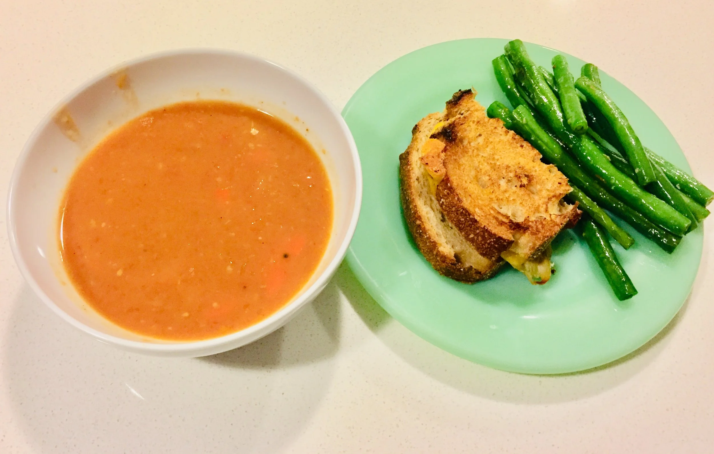 Home made tomato soup, grill cheese sandwich and green beans.