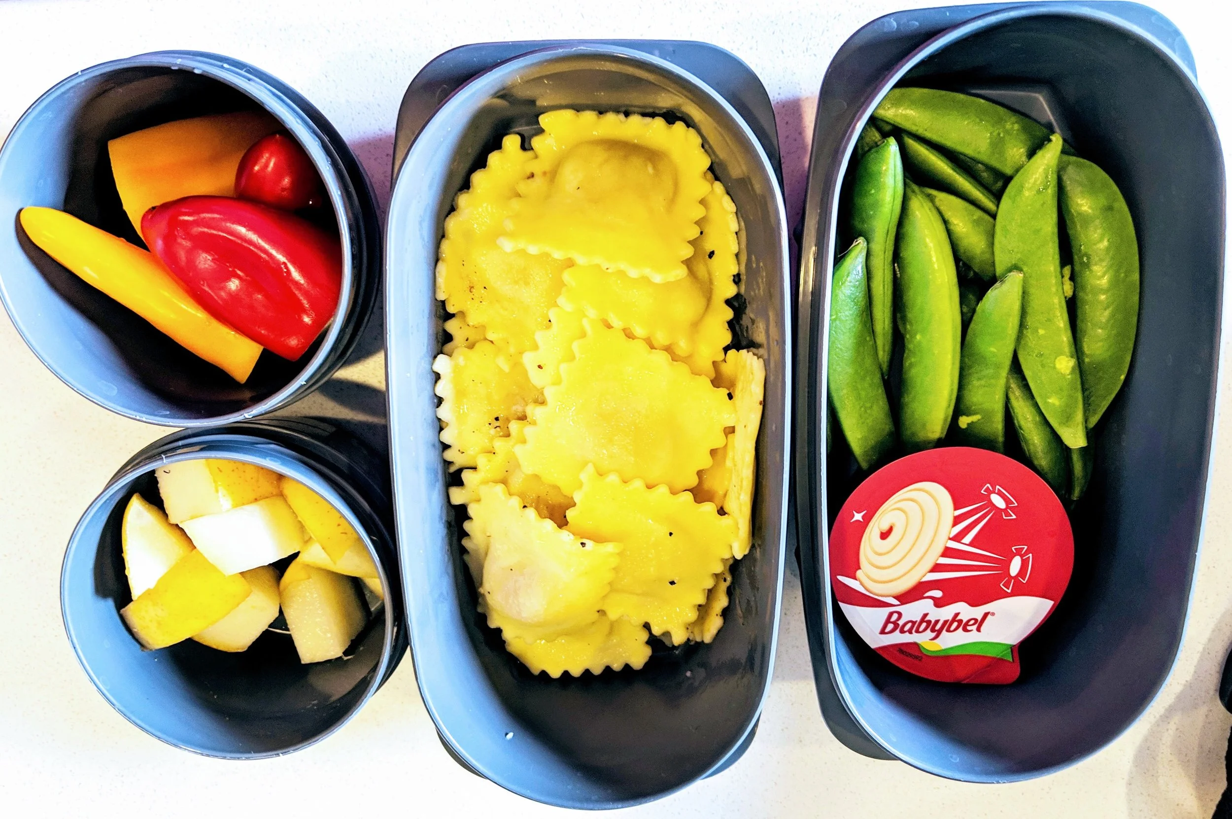 sweet mini peppers, pears, ravioli, sugar snap peas and cheese for Lunch.