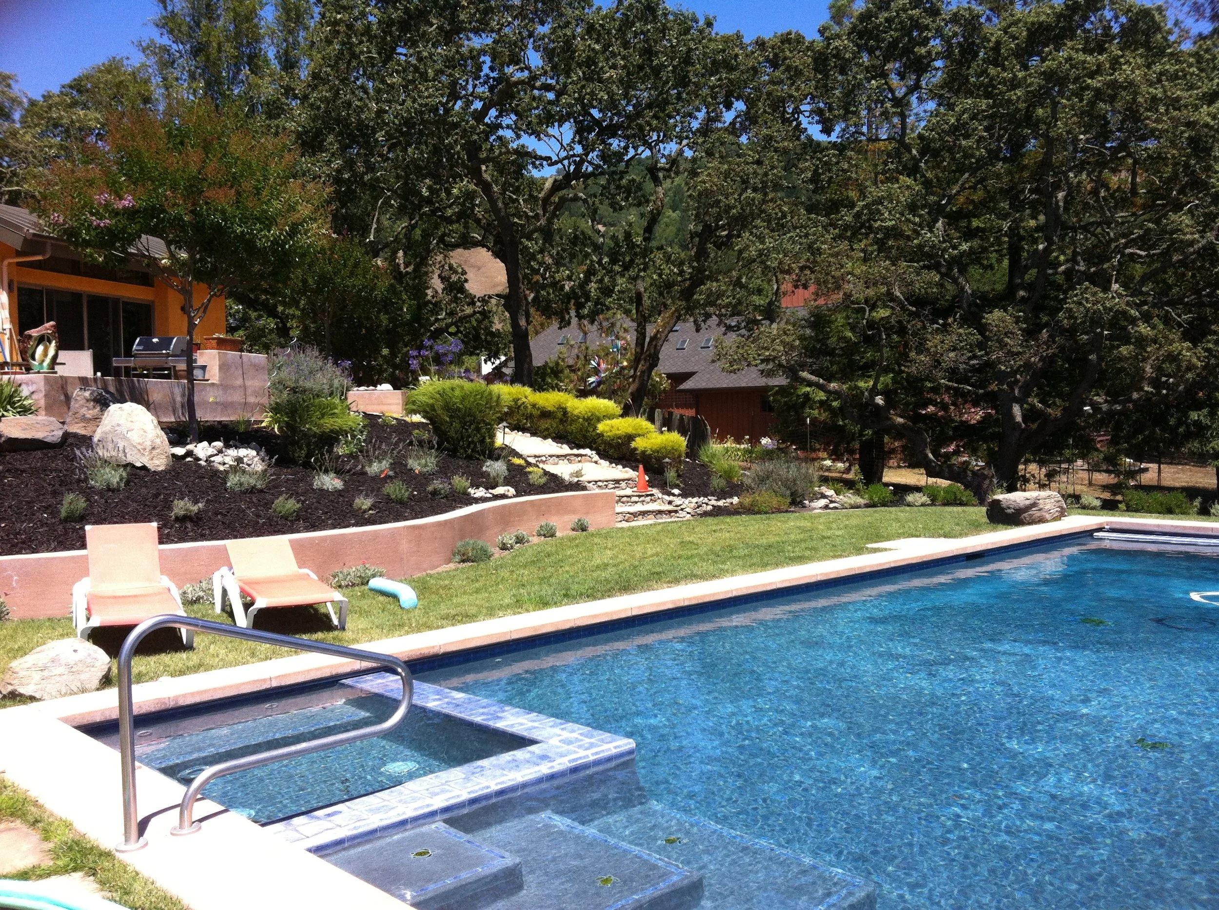  Sustainable Features:  Integral Color Hydraulic Lime Plaster  High Fly-Ash Concrete  Native Landscaping w/Permeable Hardscape 