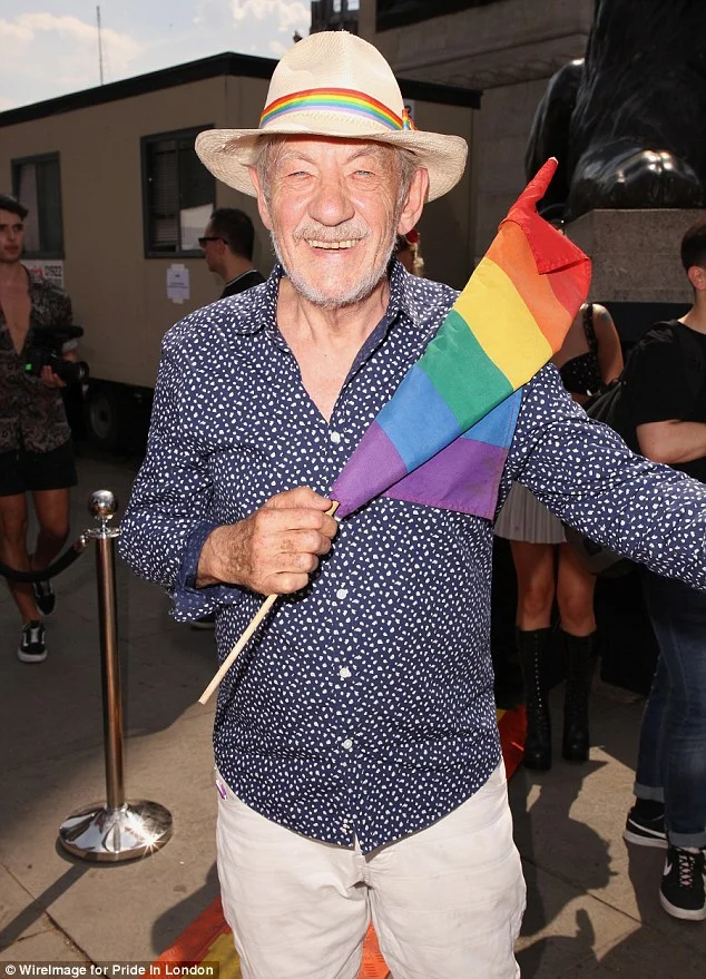 Smiles: Elsewhere, Sir Ian McKellan got in amongst the immense crowd in a dapper blue and white spotted dress shirt and khaki chinos