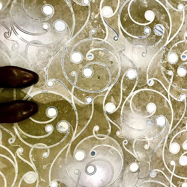 Fancy laser/cut floor tile,... a style-lized fiddlehead fern to me 😊Love the royal blue &ldquo;heads&rdquo;! #happythursday #springwatch #tileinsporation #flooring #interiordesign #mcbridedesign