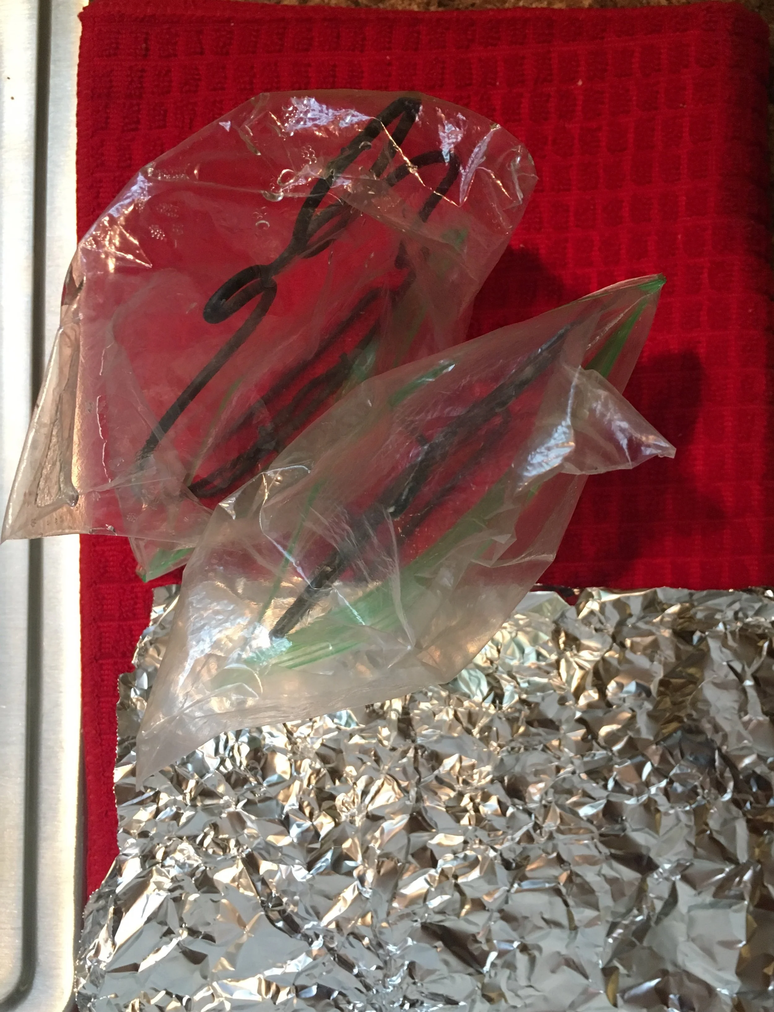 Cleaned plastic bags and aluminum foil for reuse