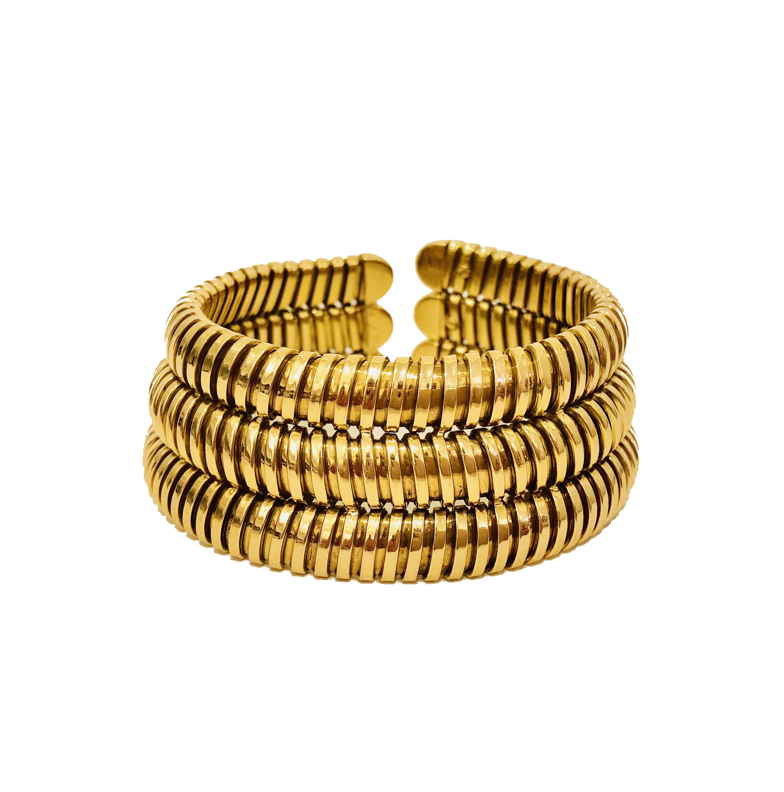 Caroline Waggoner Estate + Fine jewelry-triple yellow gold cuff.jpg