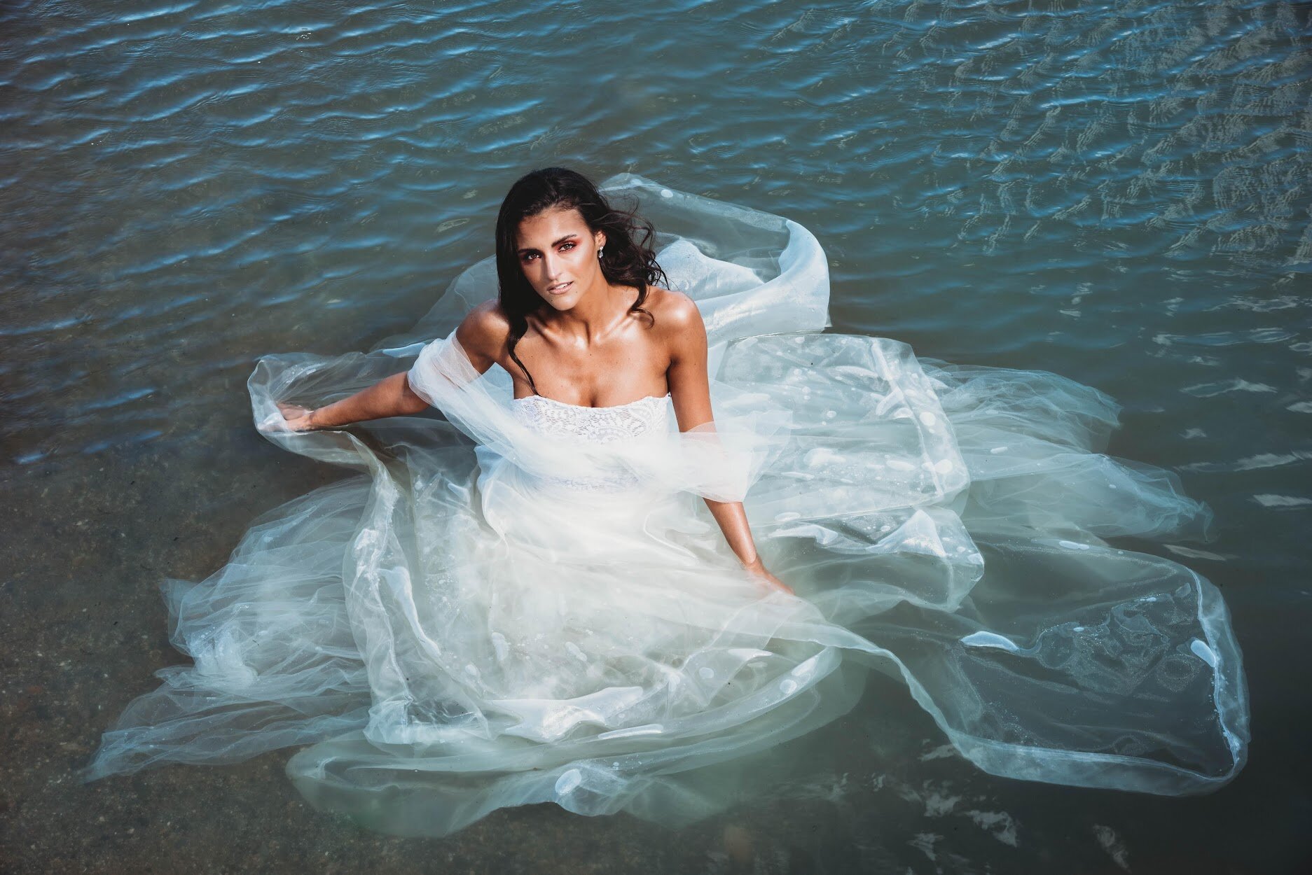 | 2019 | This bridal piece is made entirely of sustainable, recycled materials. The skirt underlay is leftover tulle, the overlay is from organza curtains I made, and the bodice is thrifted lace with boning made from zip ties. This gown was a req