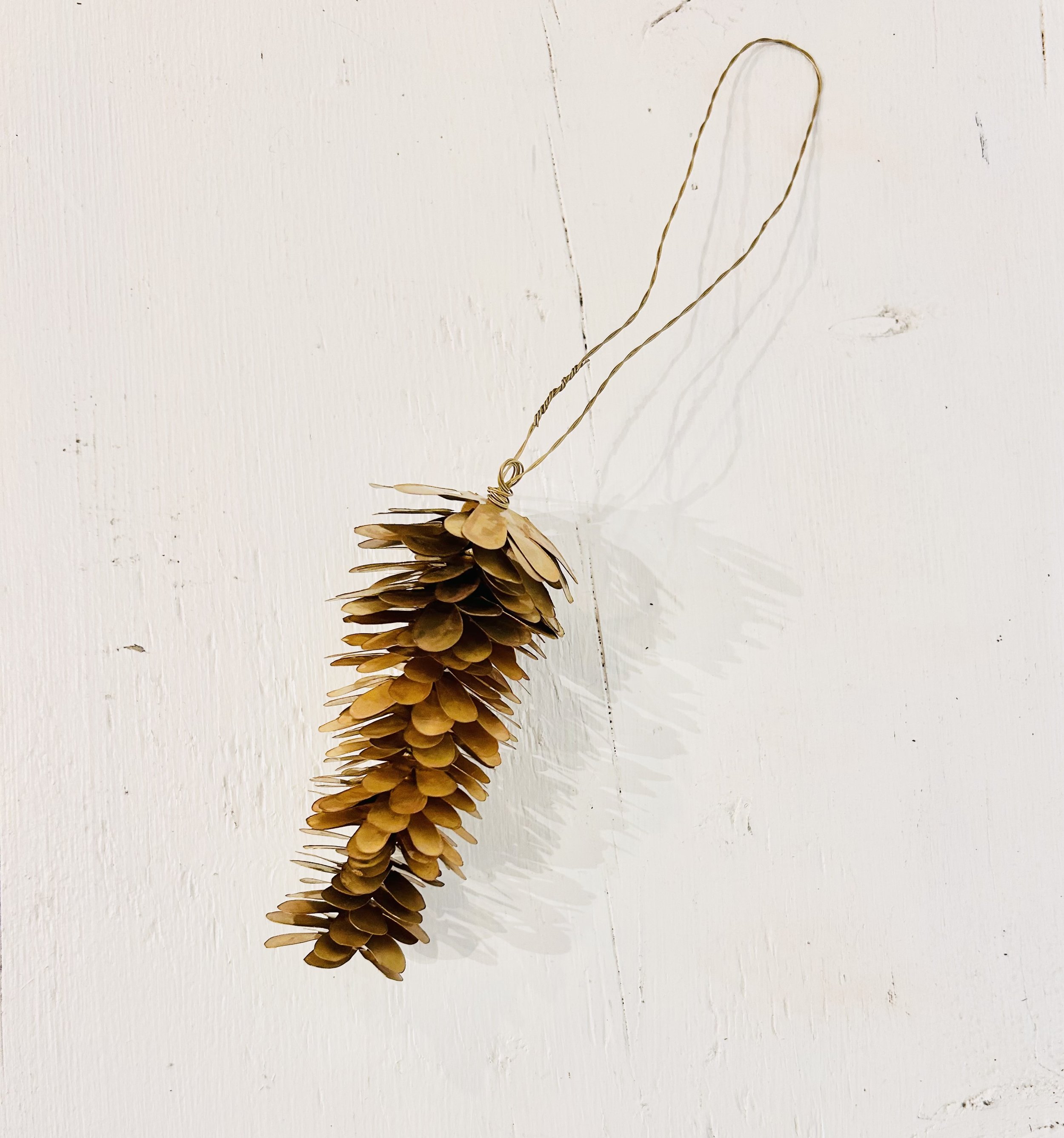 brass pinecone ornament