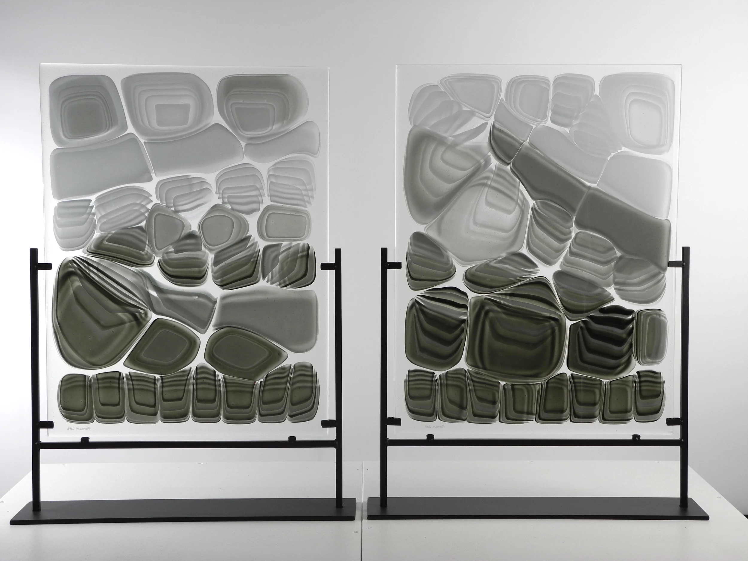 Untitled from Strata Shift series Fused Art Glass 25.5 " x 16.0 " x 4.0 " (each) AKA X-ray of an imagined creature 1